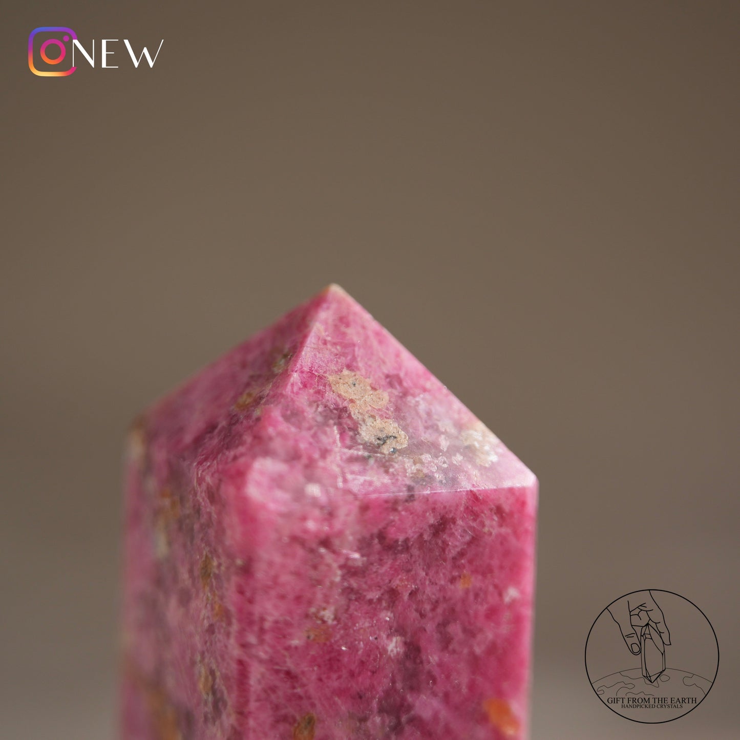 Zimbabwean rhodonite point