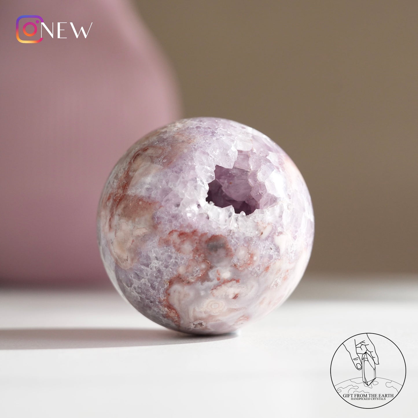 Brazilian pinkish amethyst with blossom agate sphere