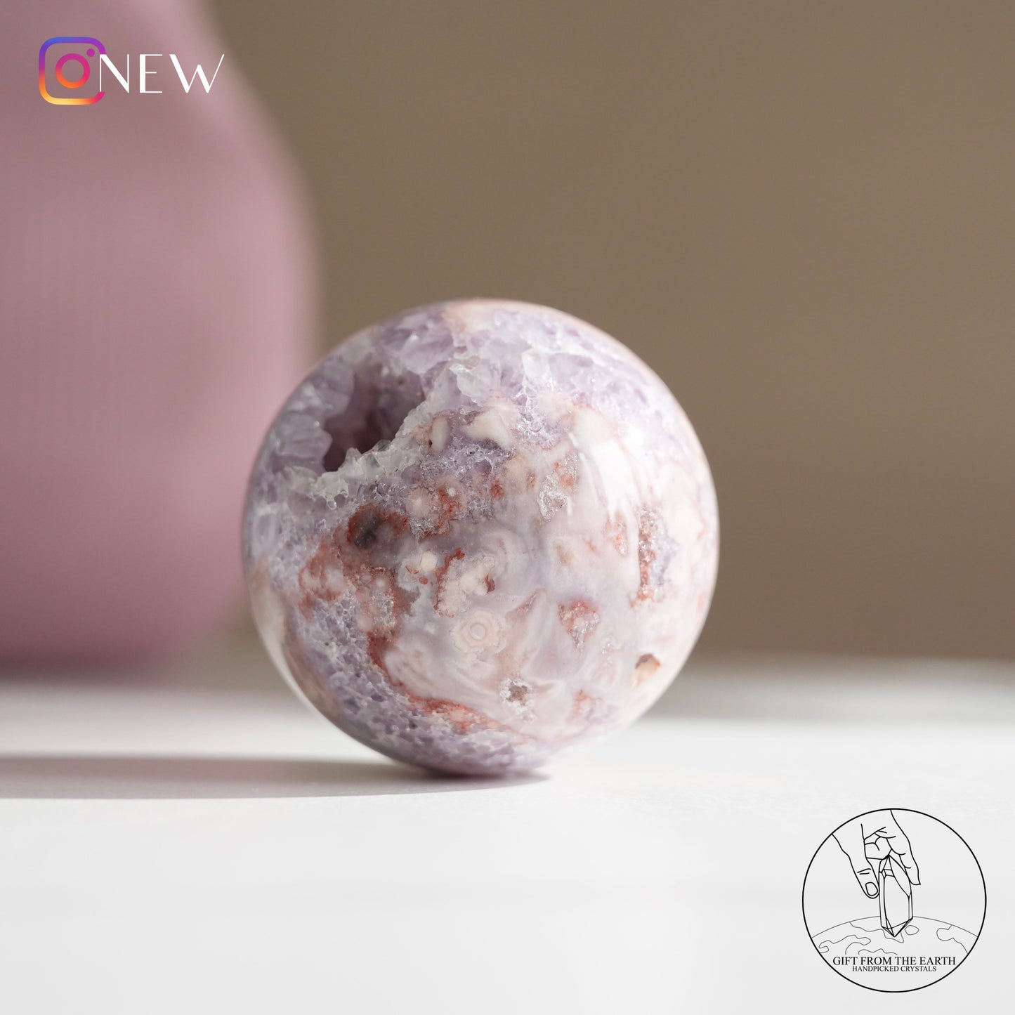 Brazilian pinkish amethyst with blossom agate sphere