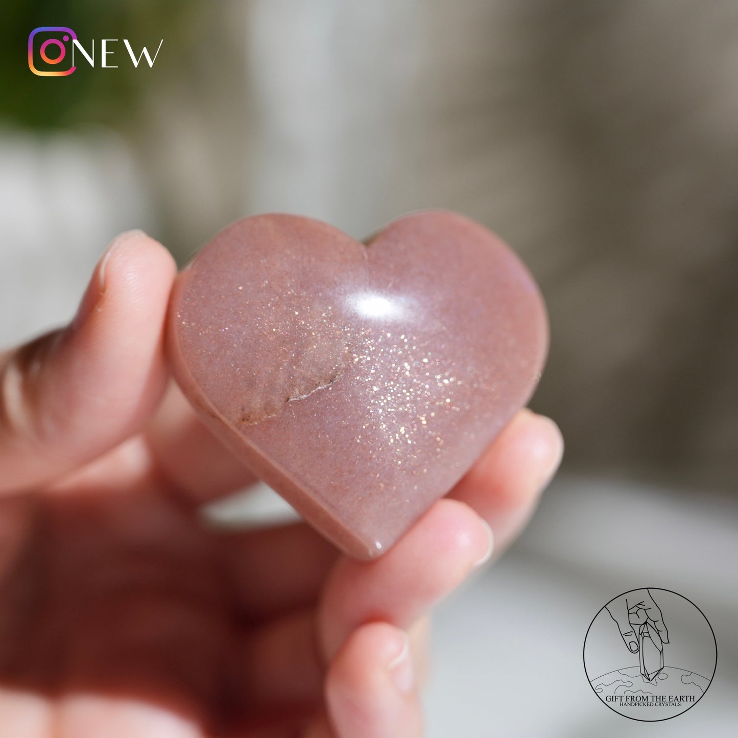 Orange moonstone heart with sunstone