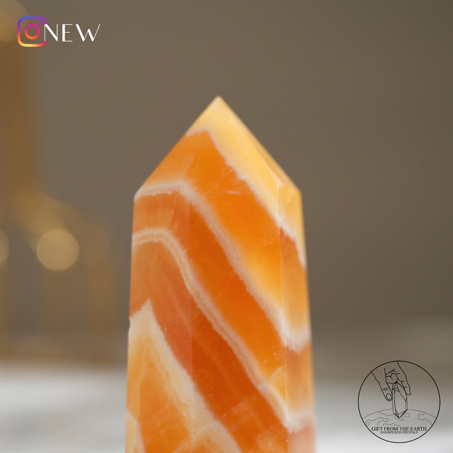 Orange calcite point