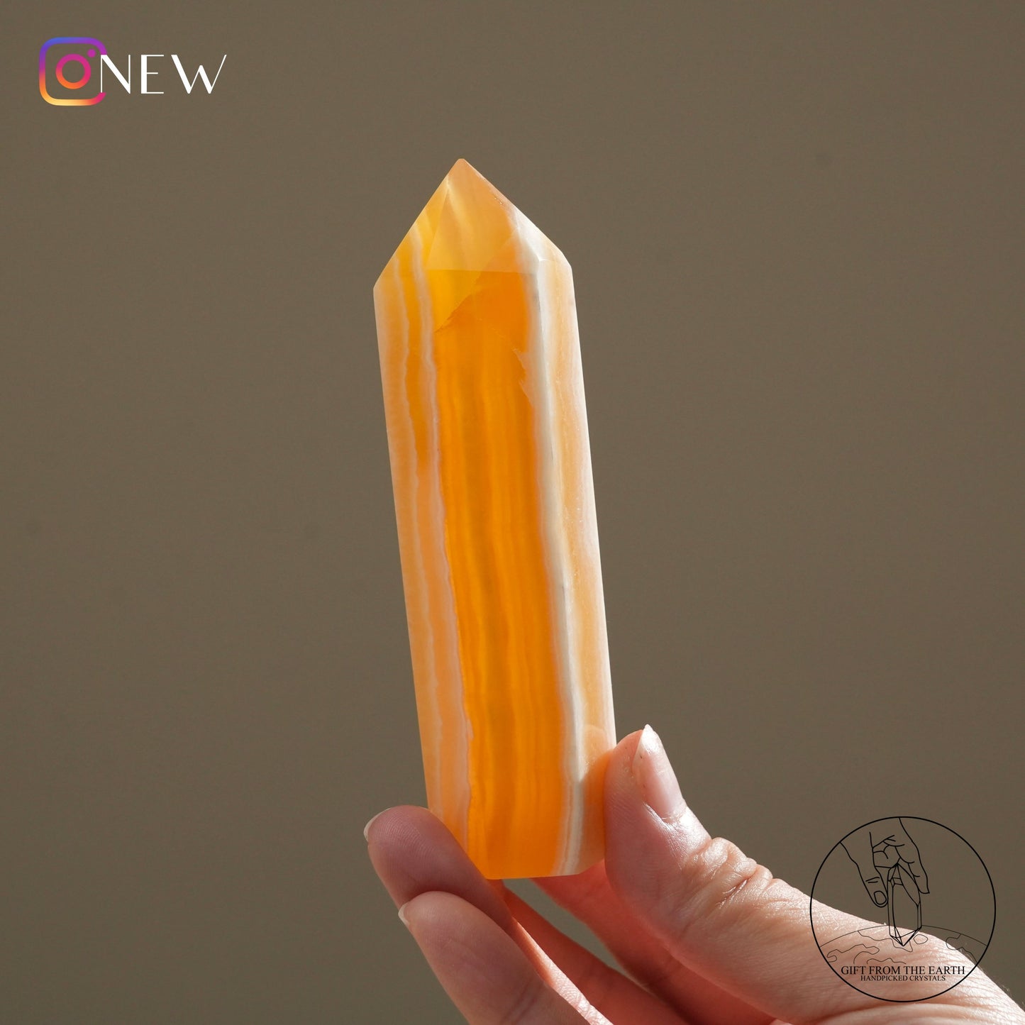 Orange calcite point