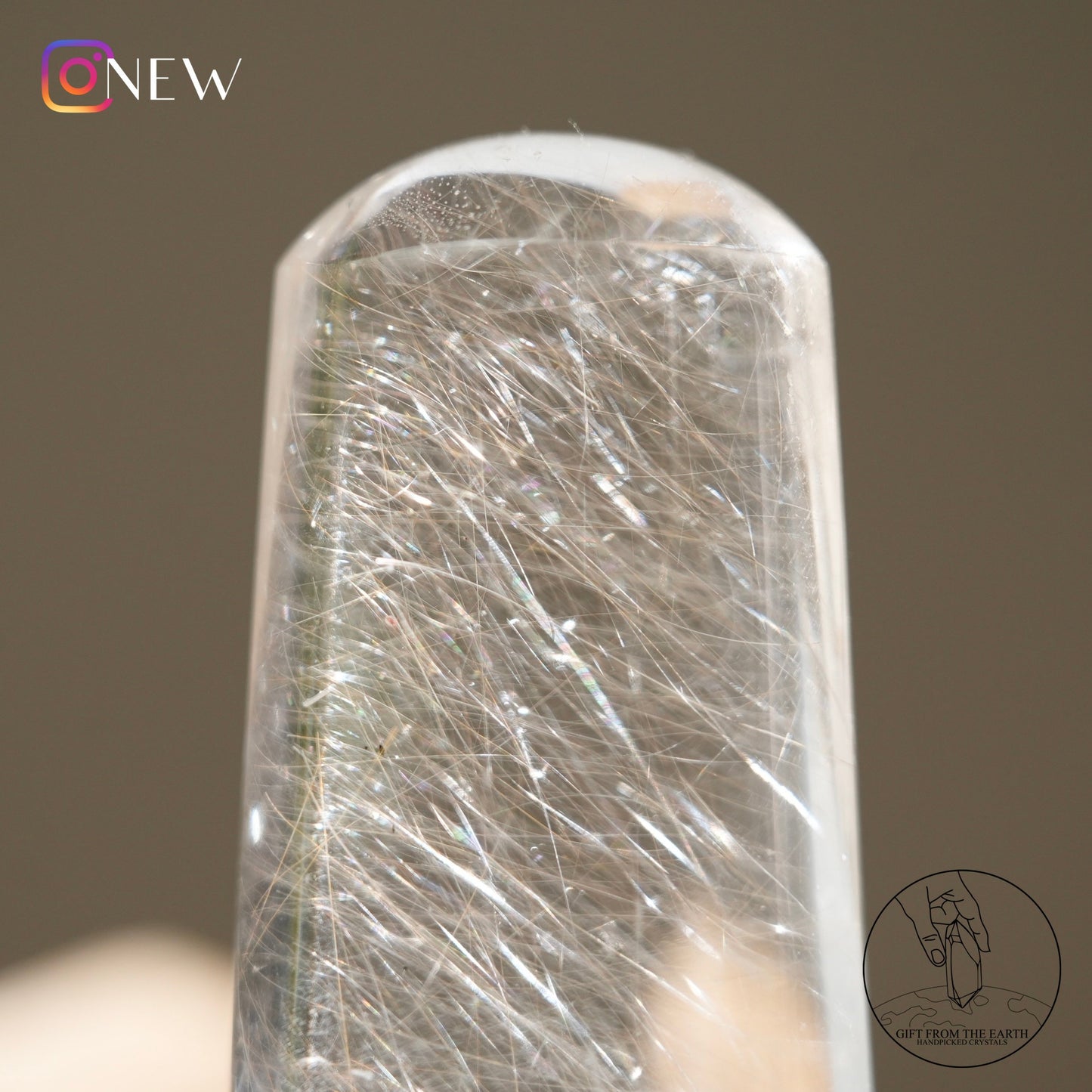 Silver rutilated quartz point