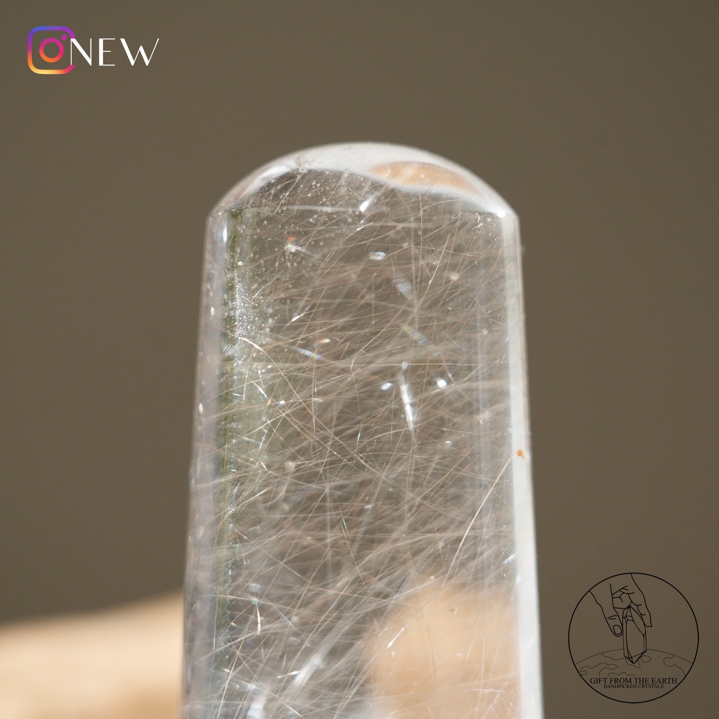 Silver rutilated quartz point