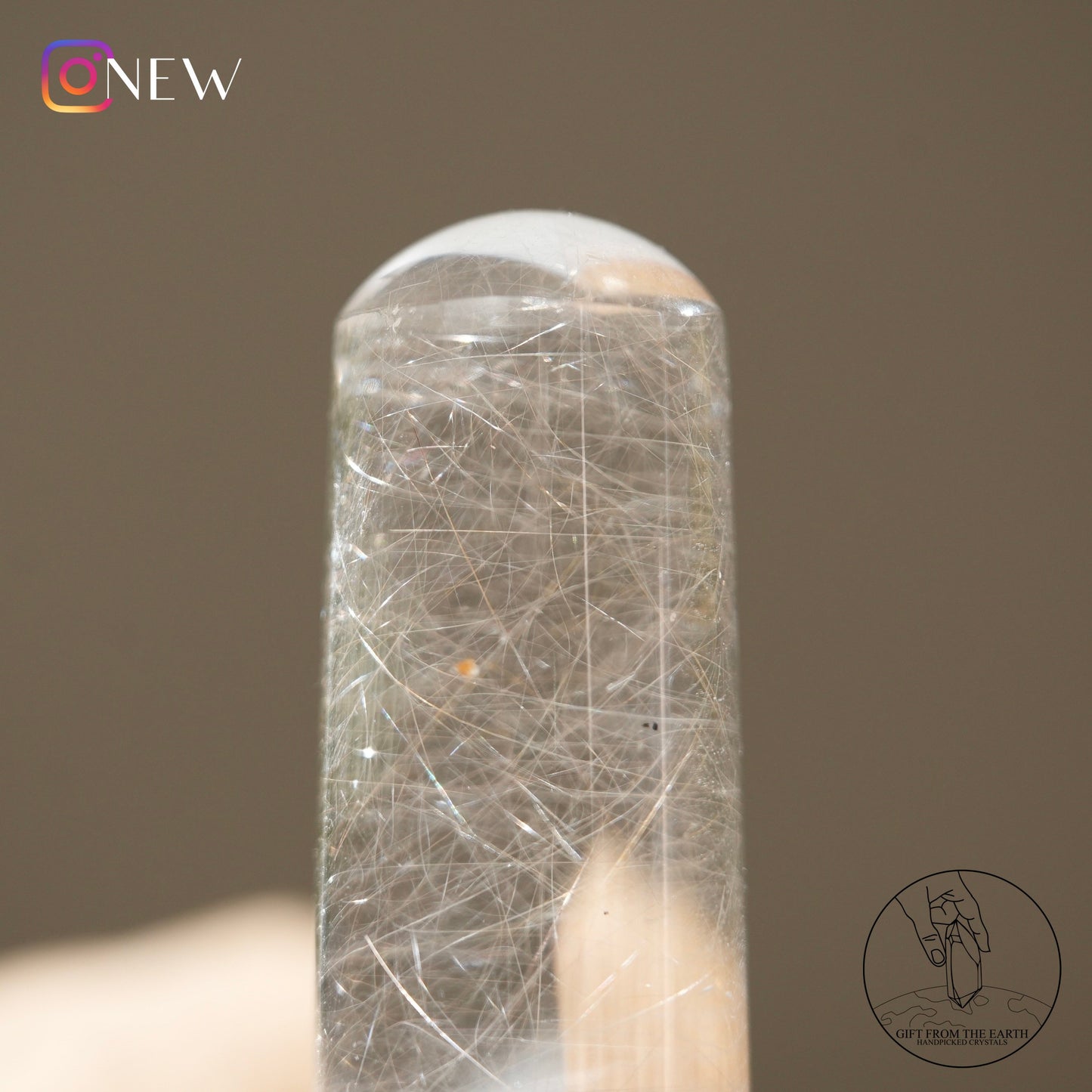 Silver rutilated quartz point