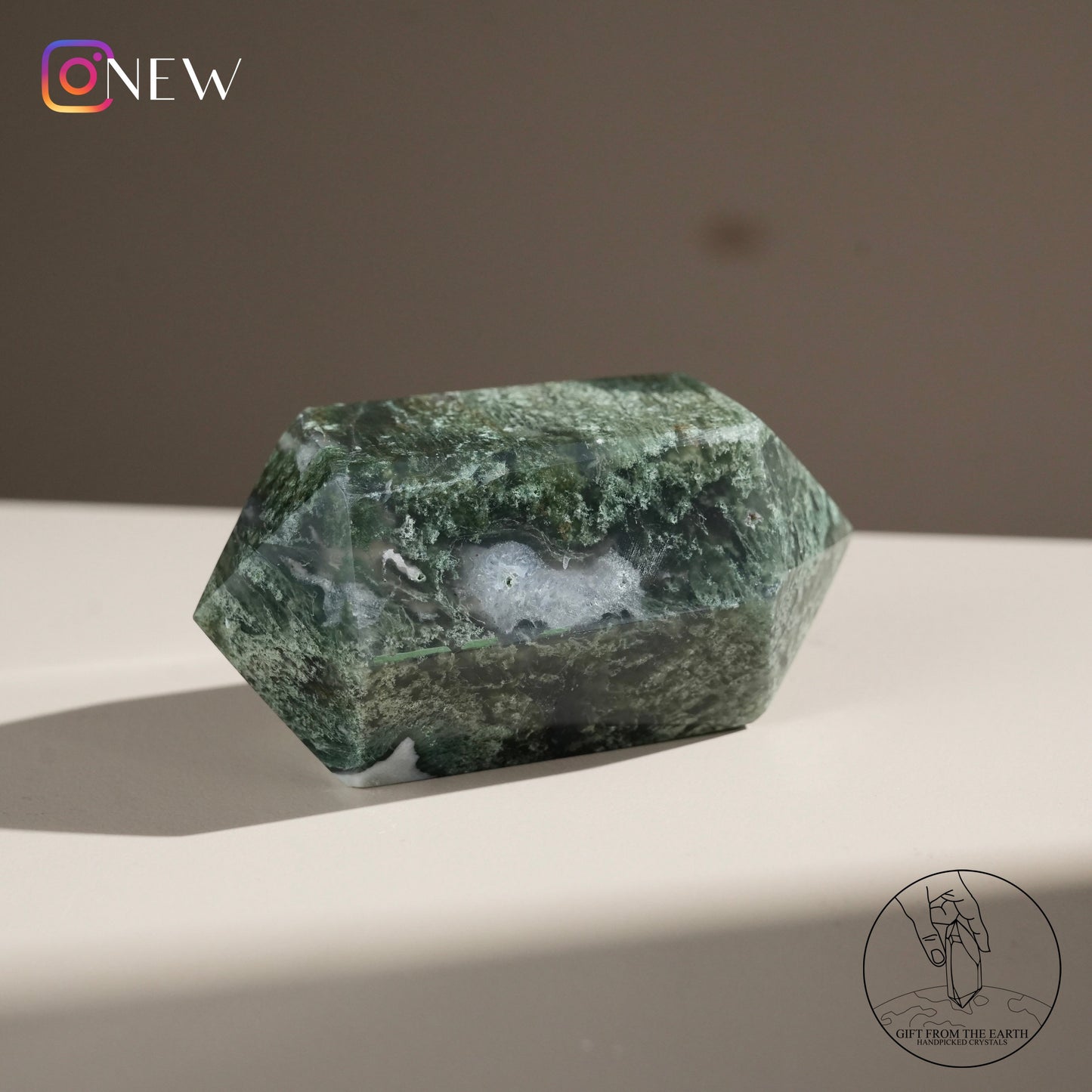 Double-terminated moss agate