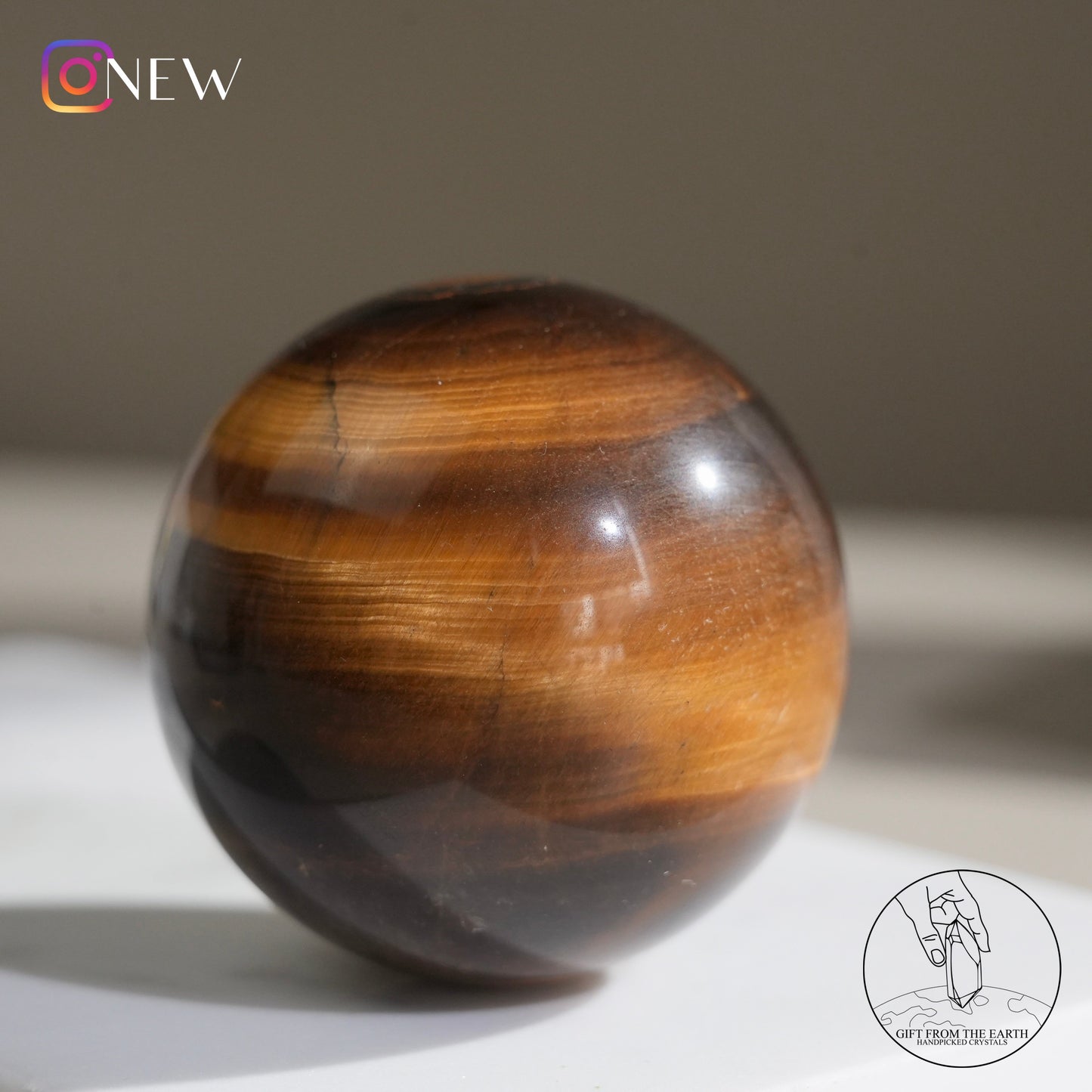 Yellow tiger's eye sphere