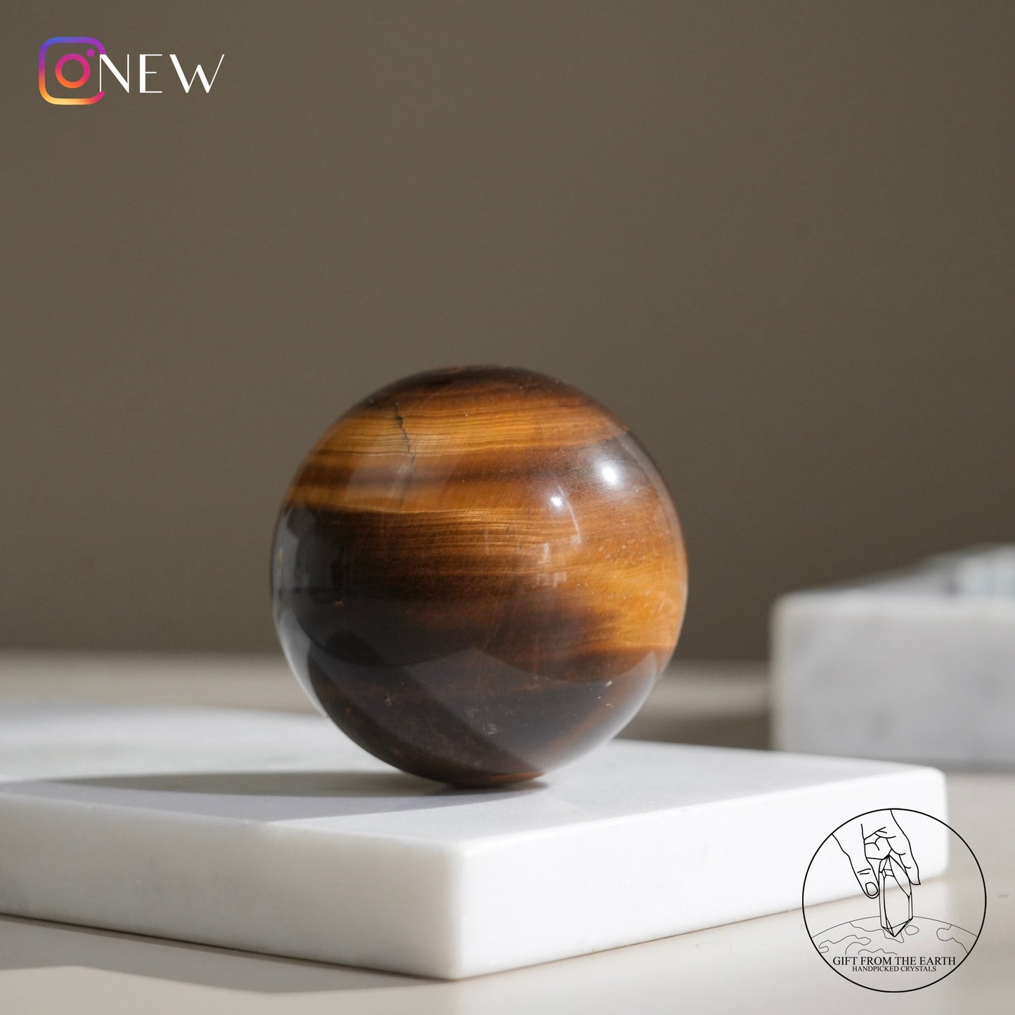 Yellow tiger's eye sphere