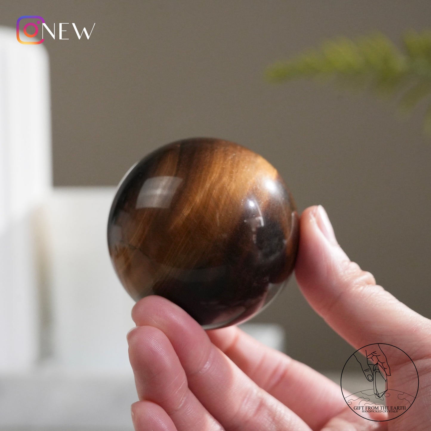 Yellow tiger's eye sphere