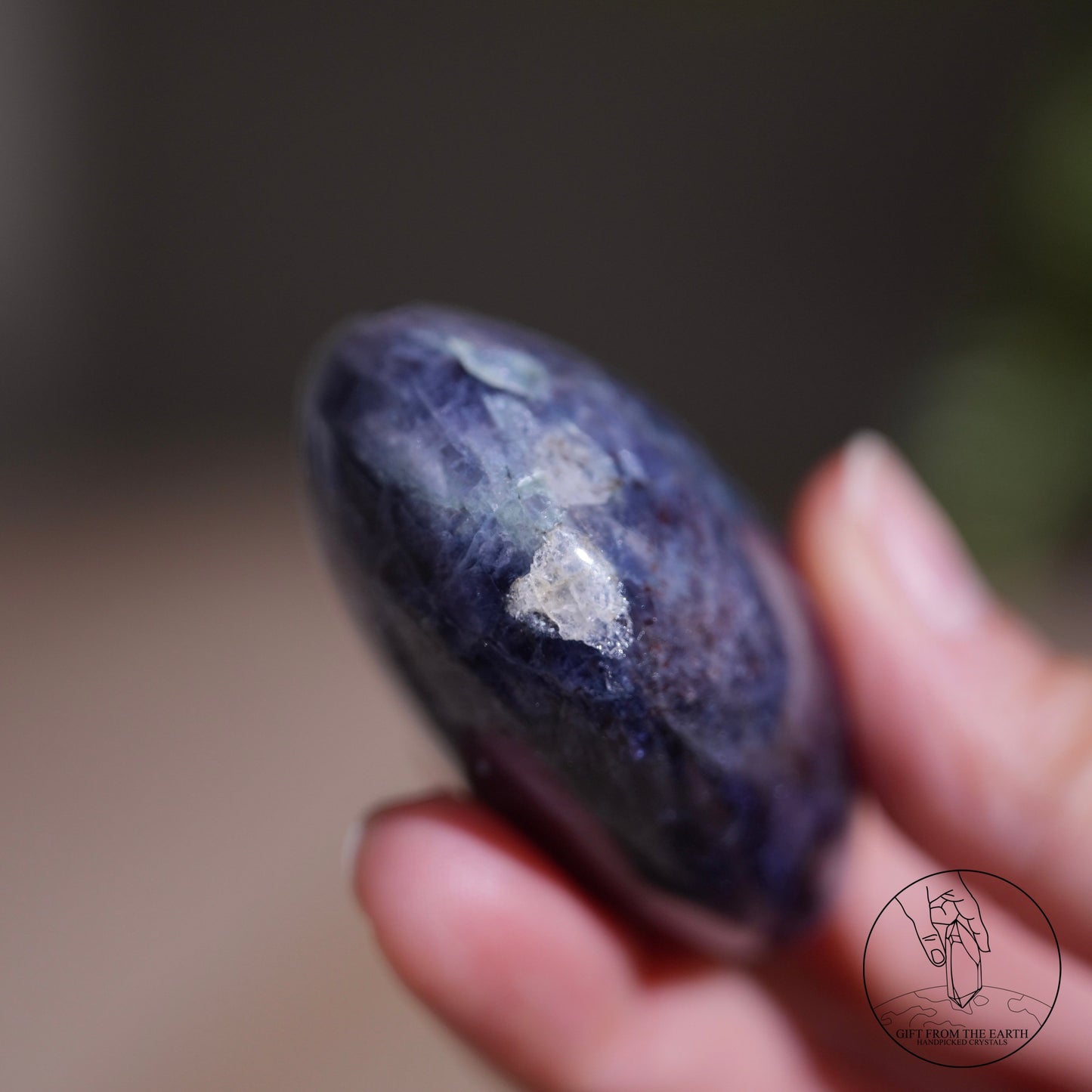 Iolite with stberry quartz