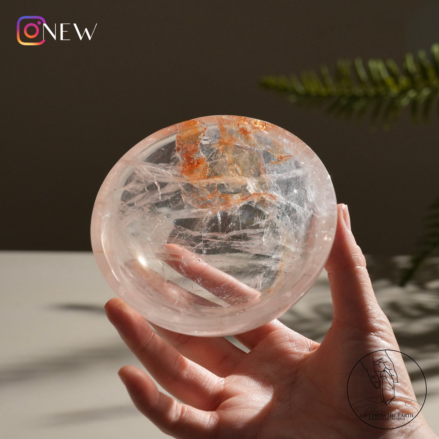 Clear quartz bowl with golden healer (pale pink)