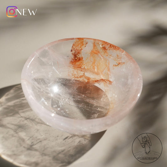 Clear quartz bowl with golden healer (pale pink)