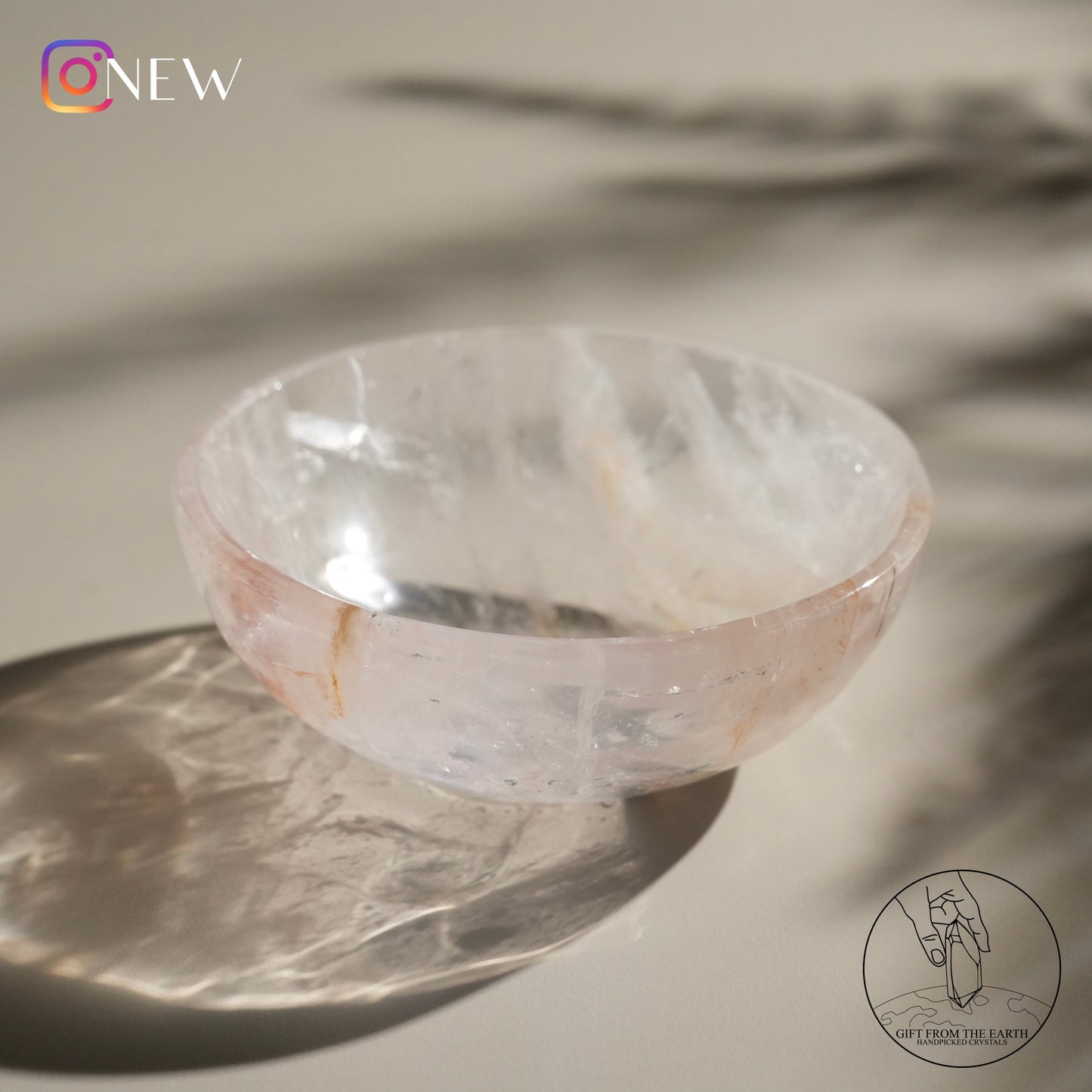 Clear quartz bowl with fire quartz & golden healer (pale pink)