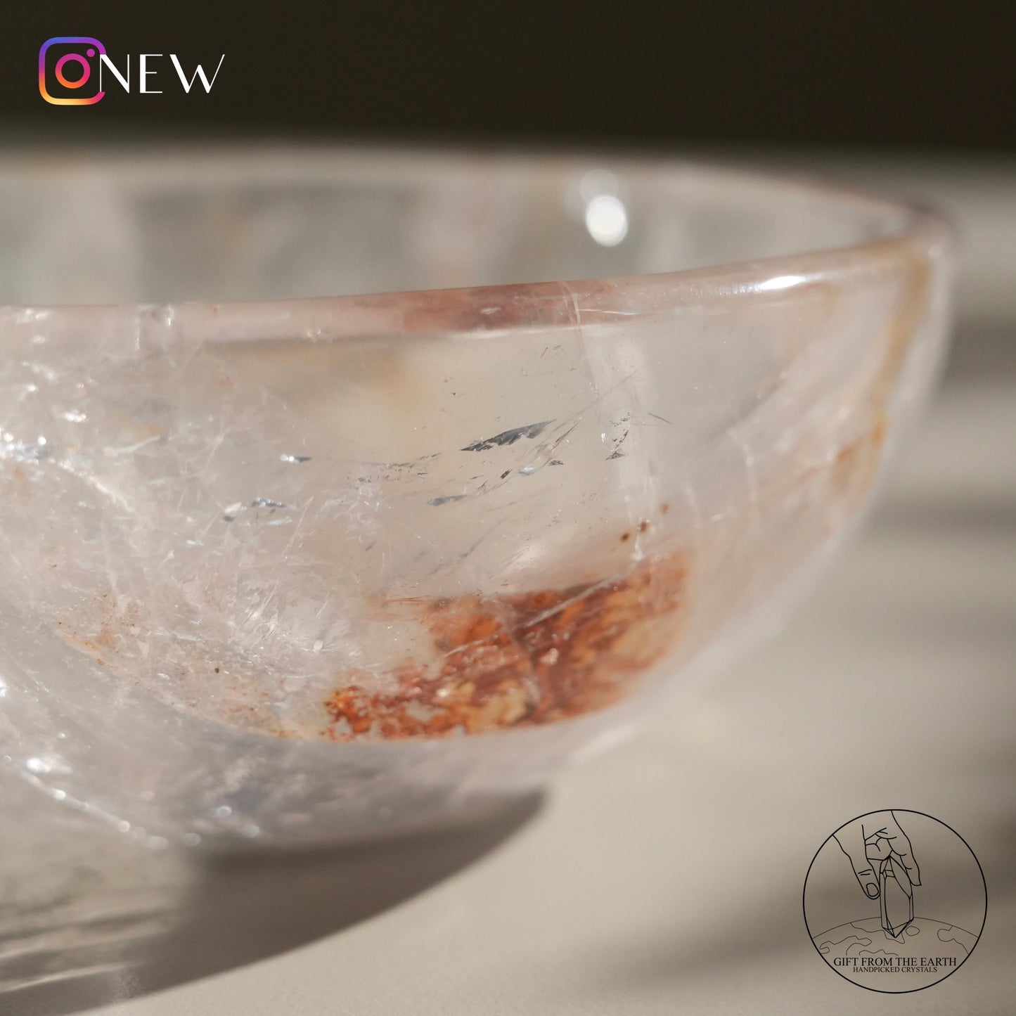 Clear quartz bowl with fire quartz & golden healer (pale pink)