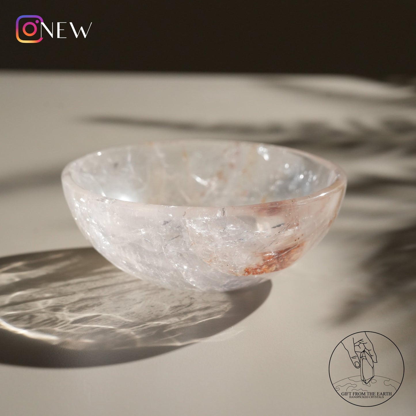 Clear quartz bowl with fire quartz & golden healer (pale pink)