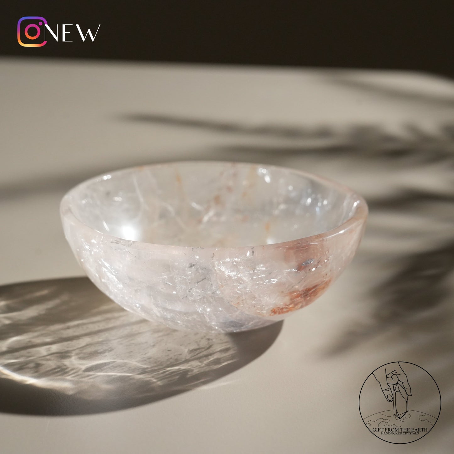 Clear quartz bowl with fire quartz & golden healer (pale pink)