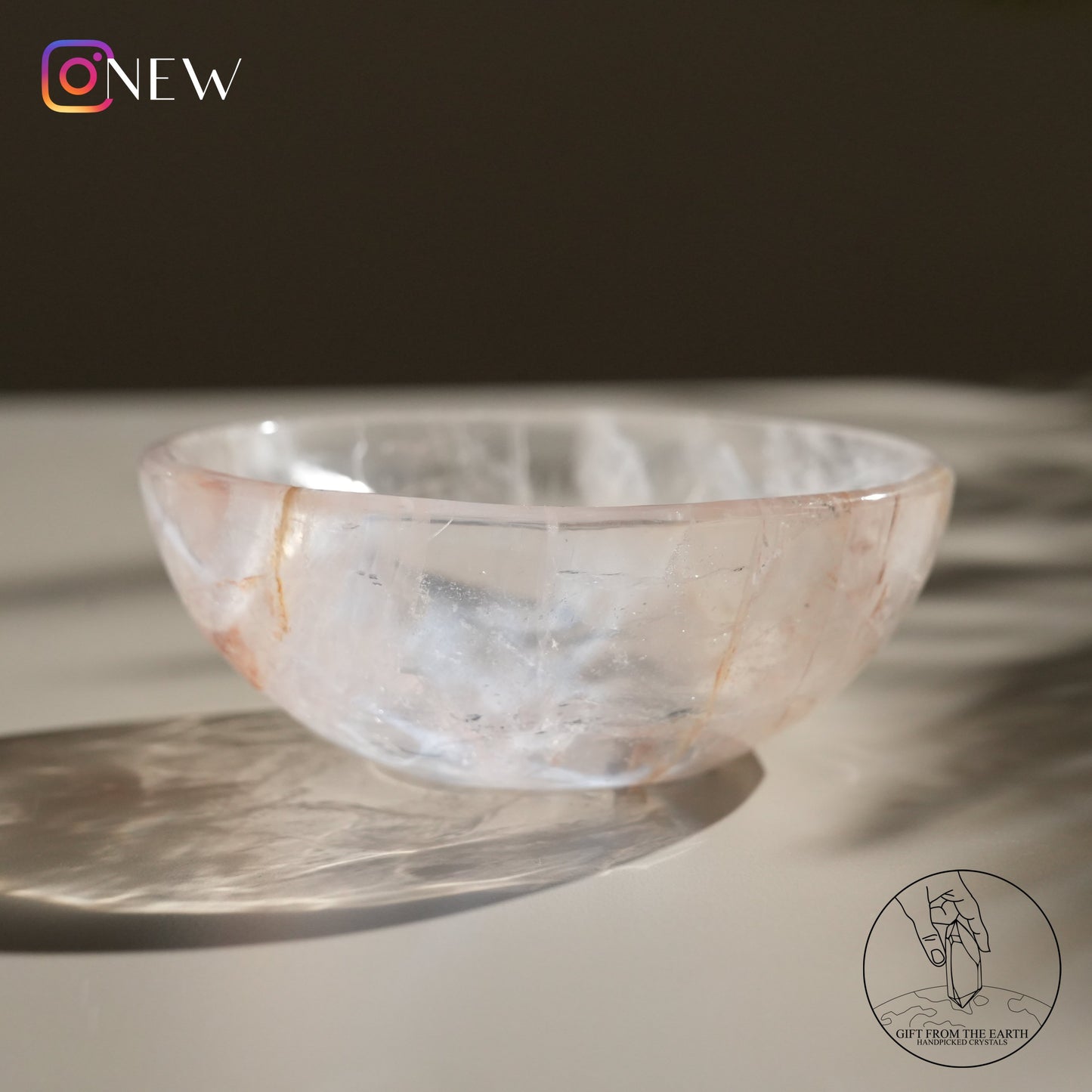 Clear quartz bowl with fire quartz & golden healer (pale pink)