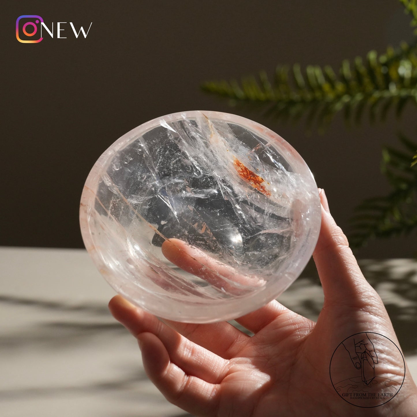 Clear quartz bowl with fire quartz & golden healer (pale pink)