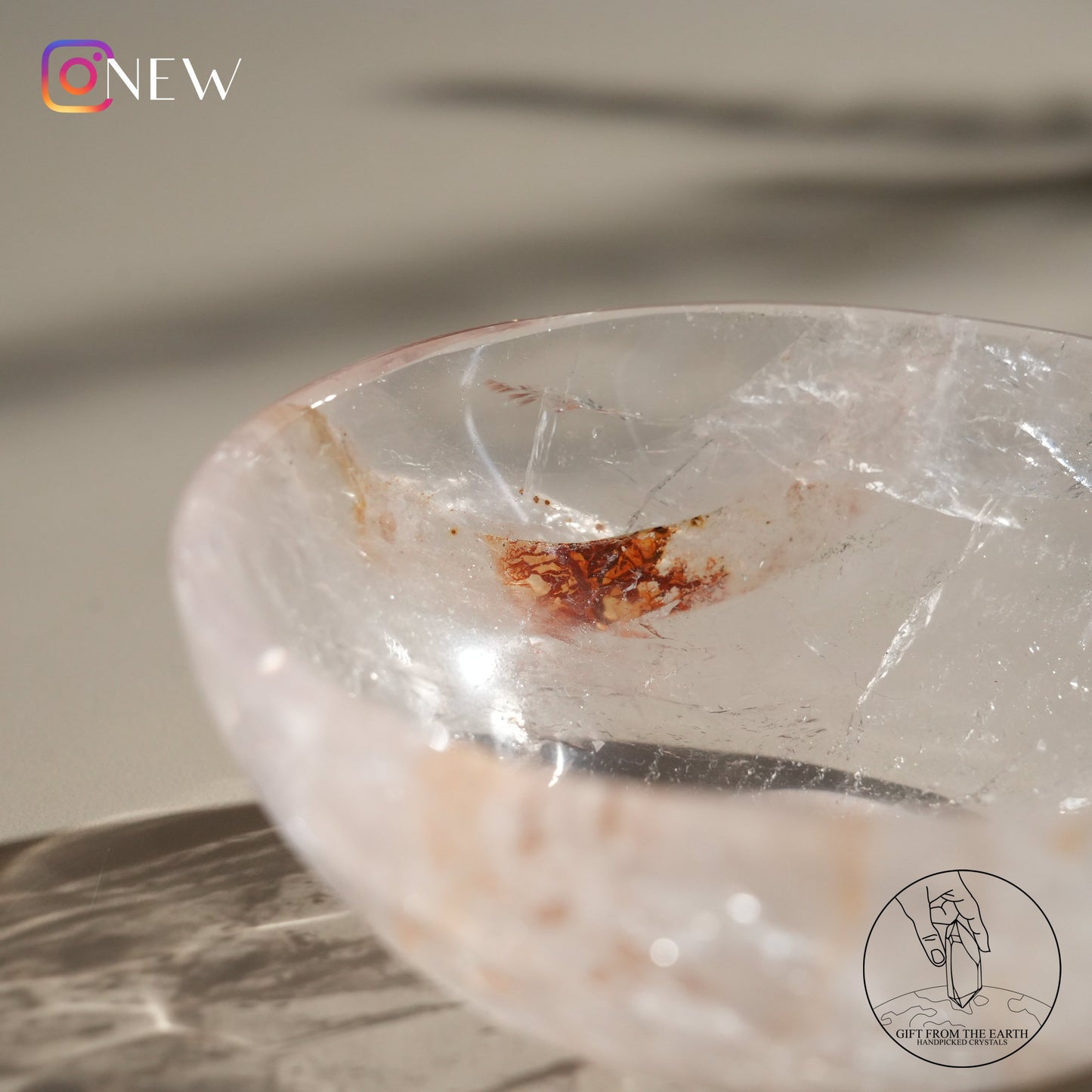 Clear quartz bowl with fire quartz & golden healer (pale pink)