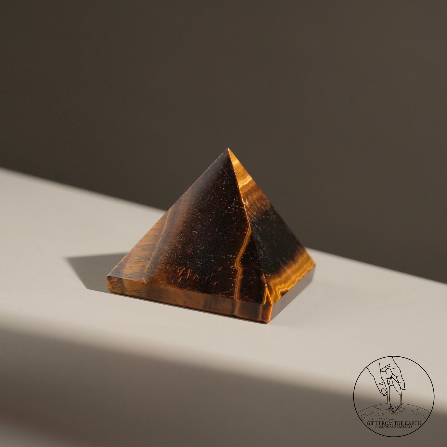 Yellow tiger's eye pyramid