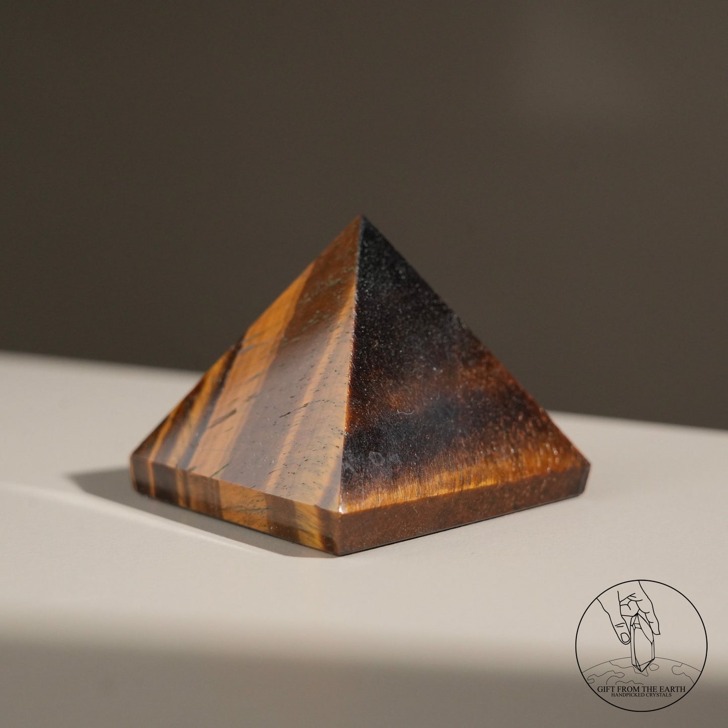 Yellow tiger's eye pyramid