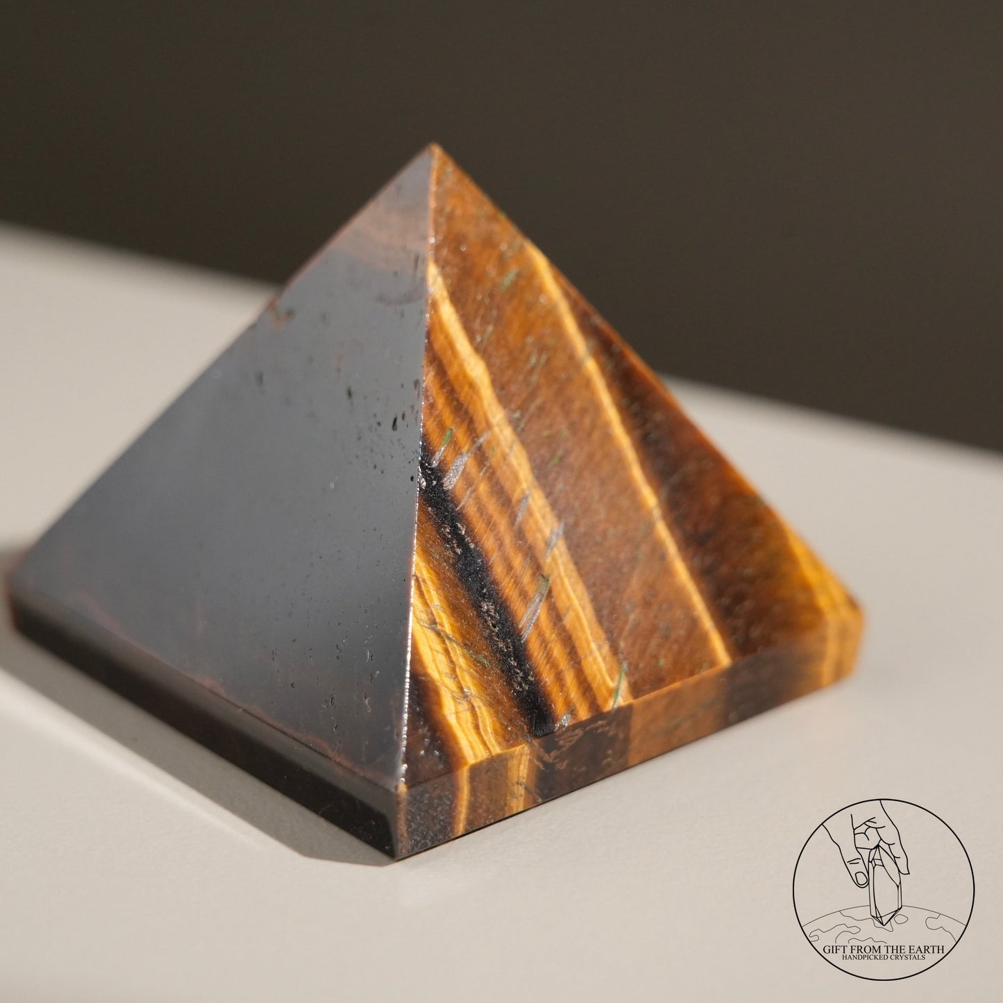 Yellow tiger's eye pyramid