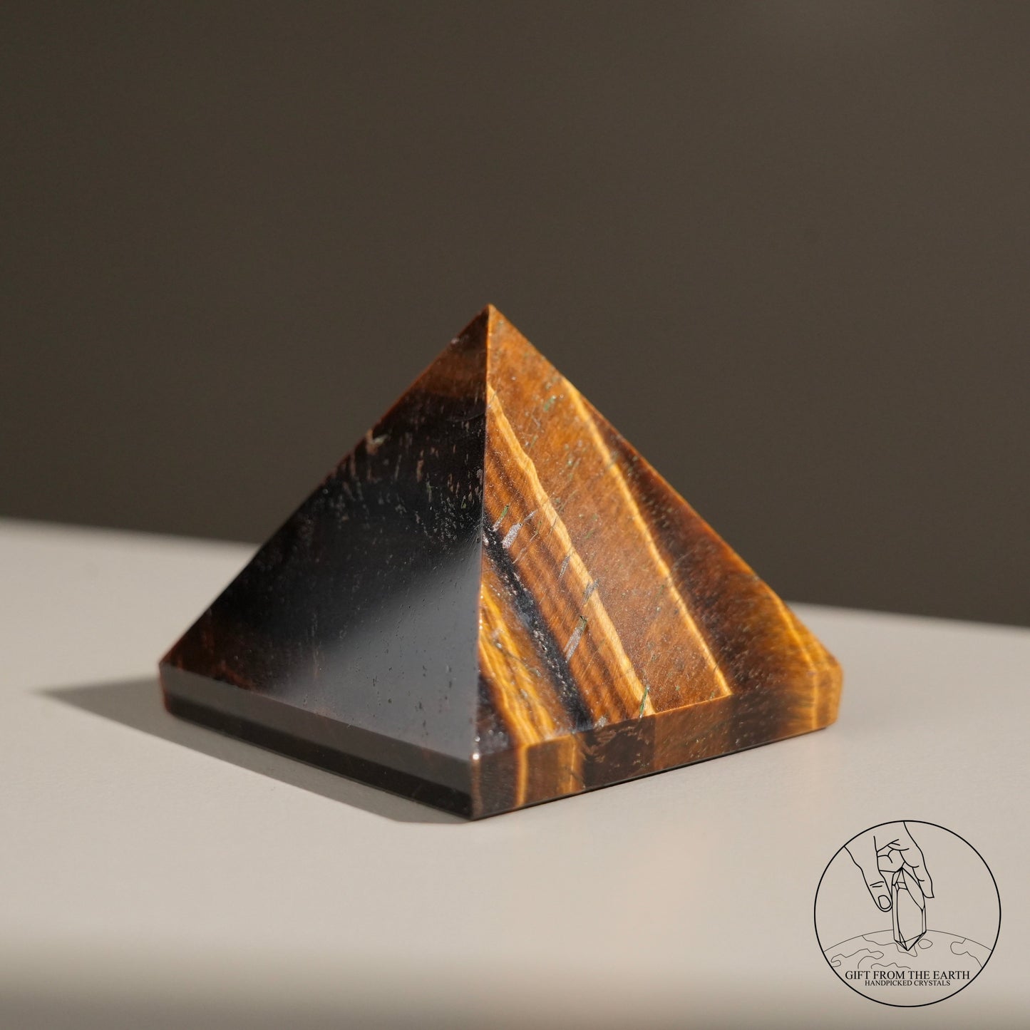 Yellow tiger's eye pyramid