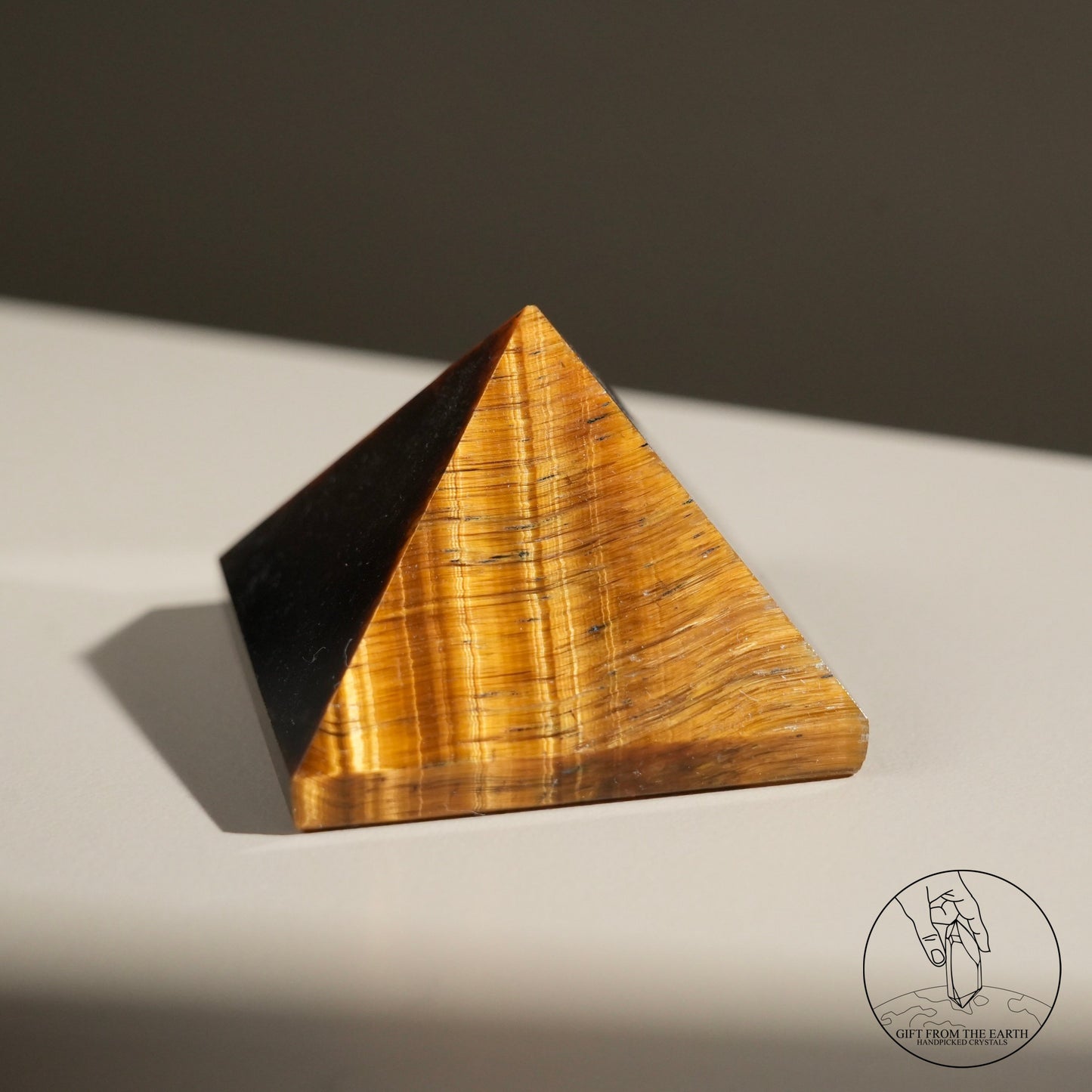 Yellow tiger's eye pyramid