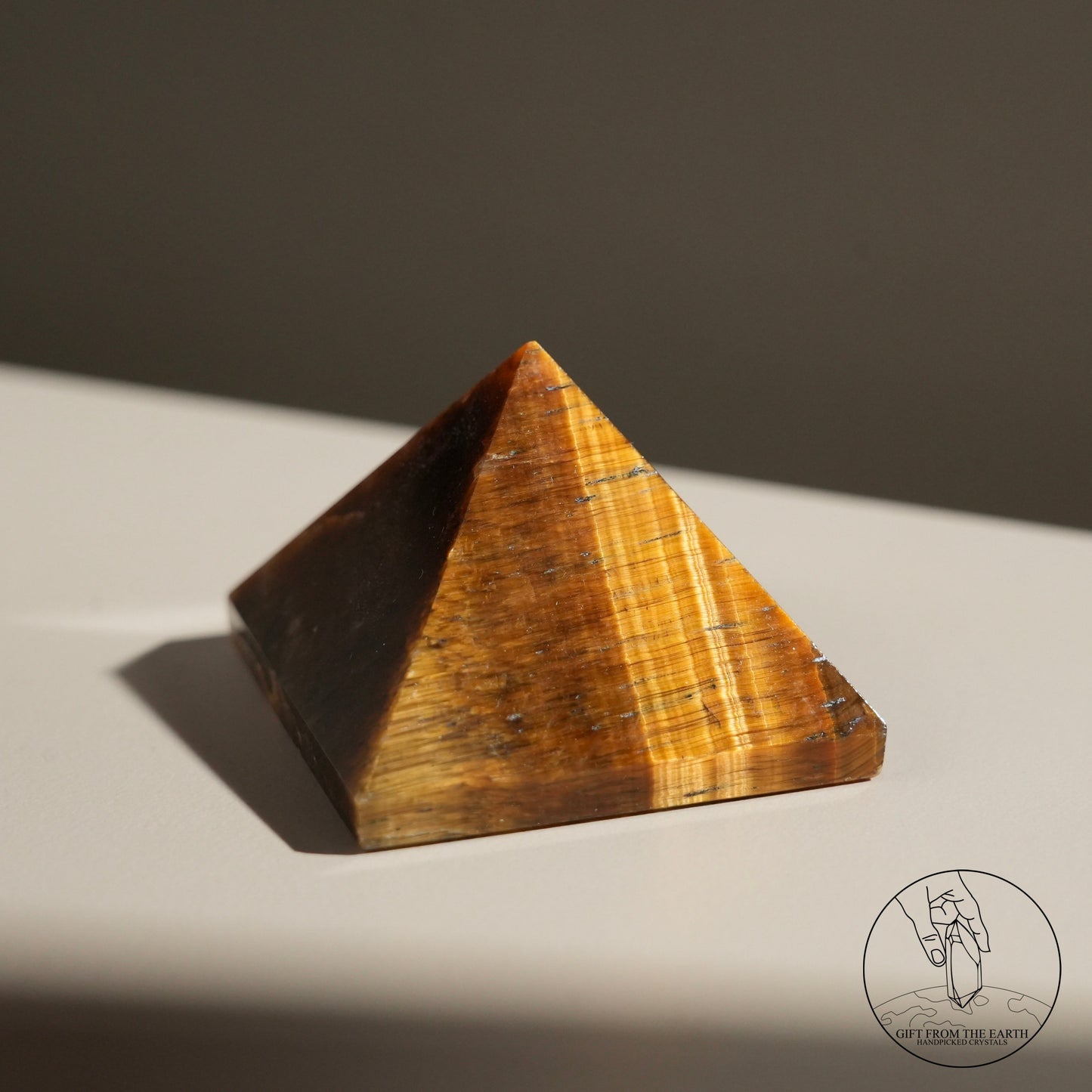 Yellow tiger's eye pyramid