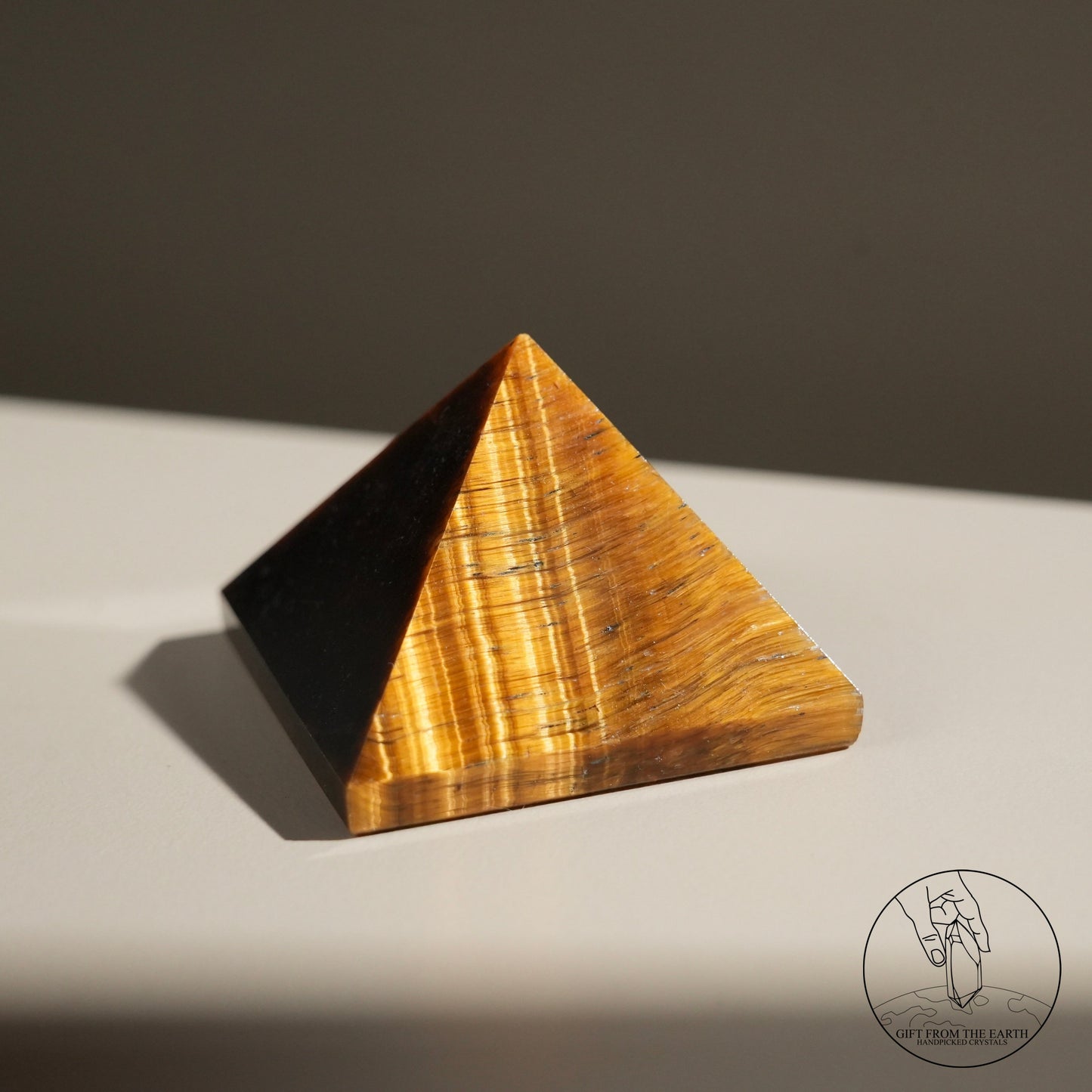 Yellow tiger's eye pyramid