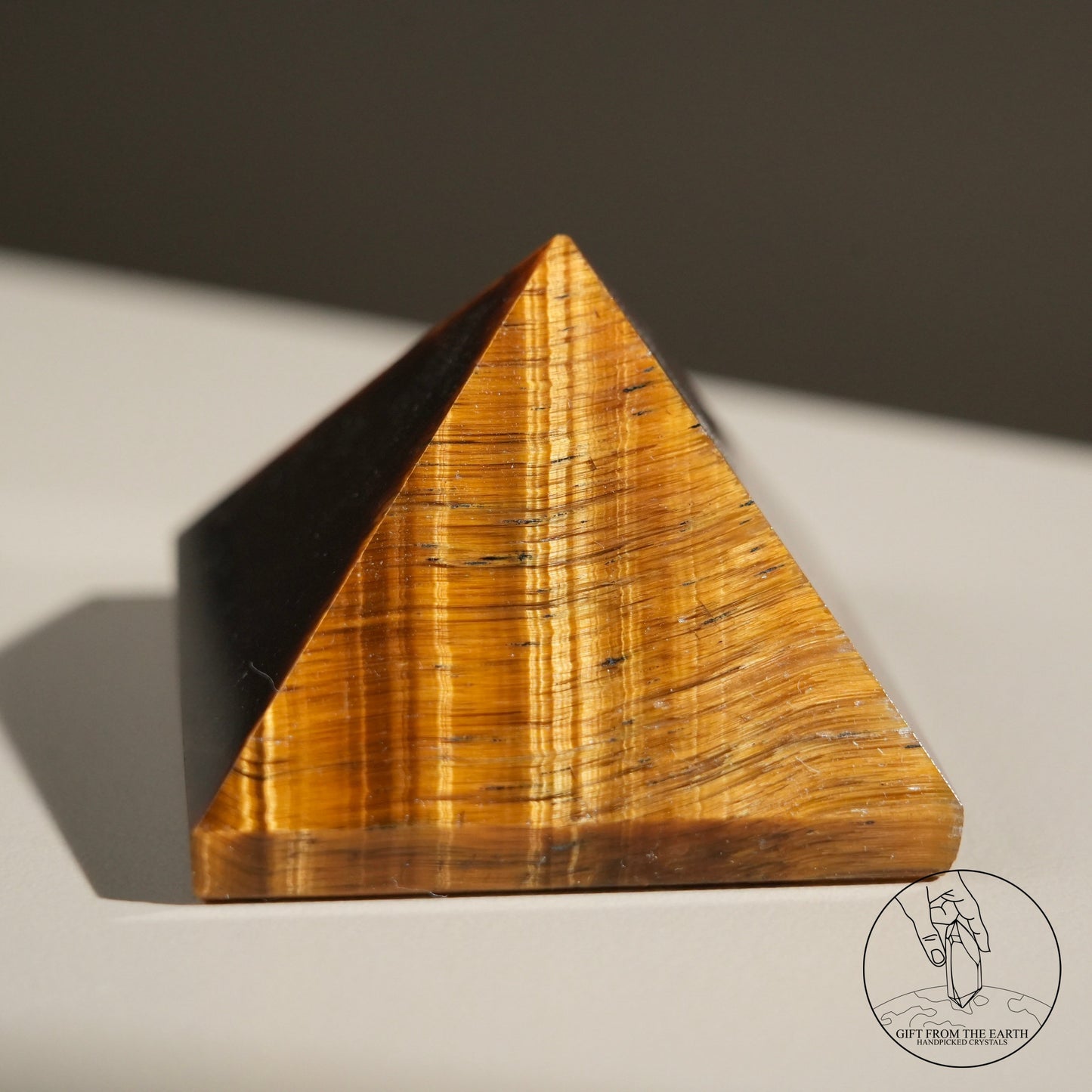 Yellow tiger's eye pyramid