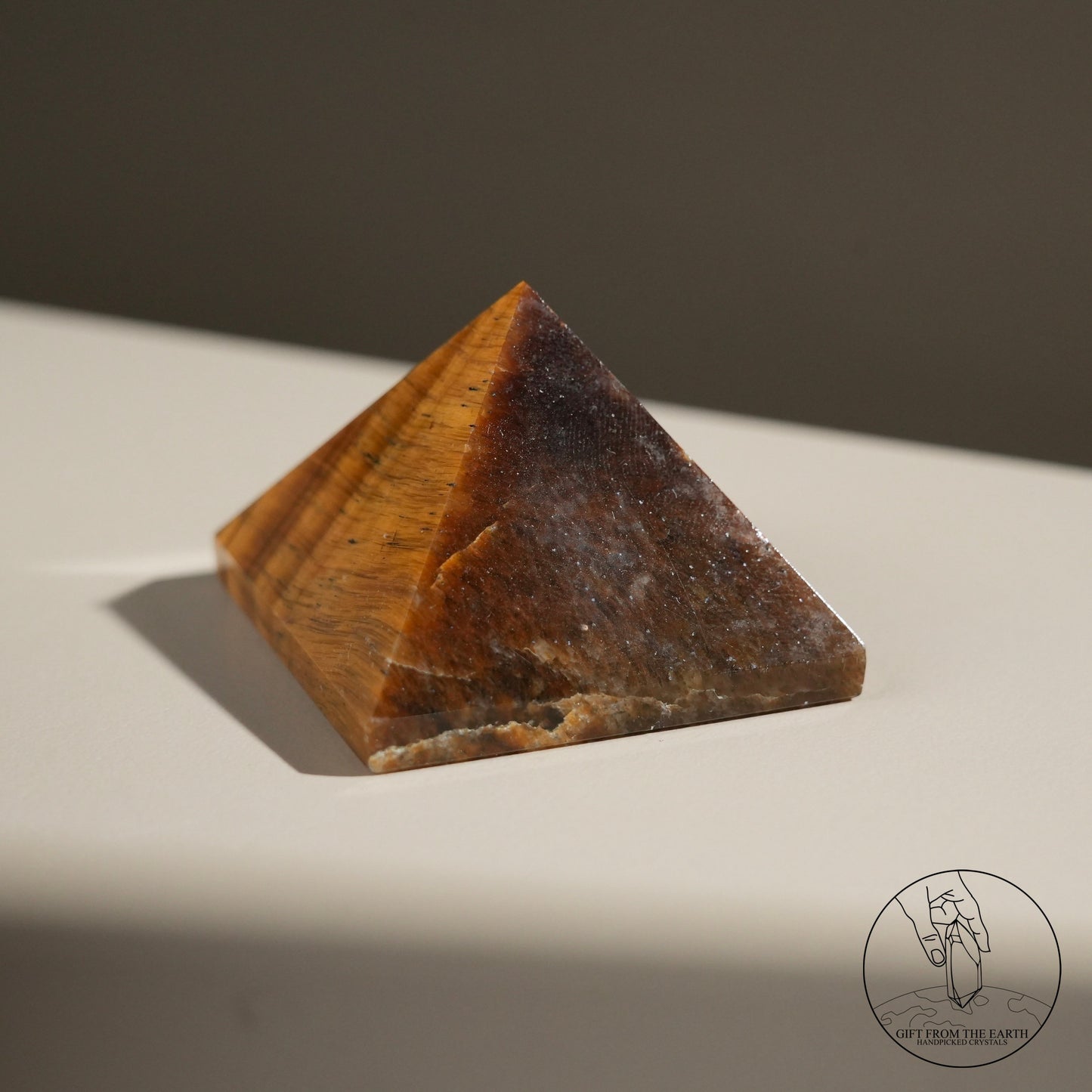 Yellow tiger's eye pyramid