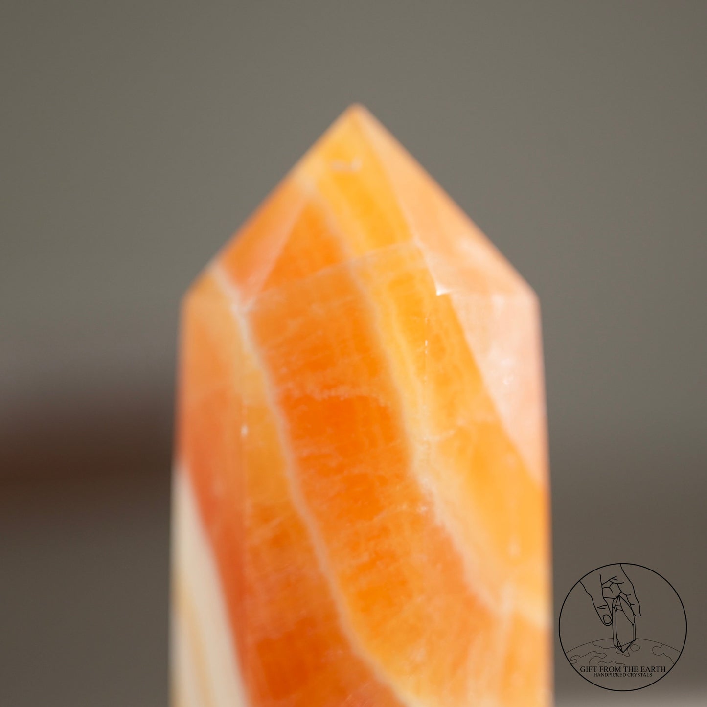 Orange calcite point