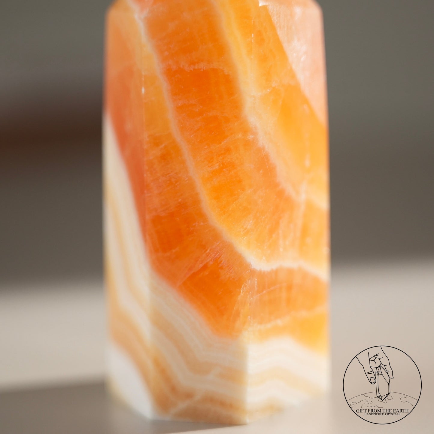 Orange calcite point