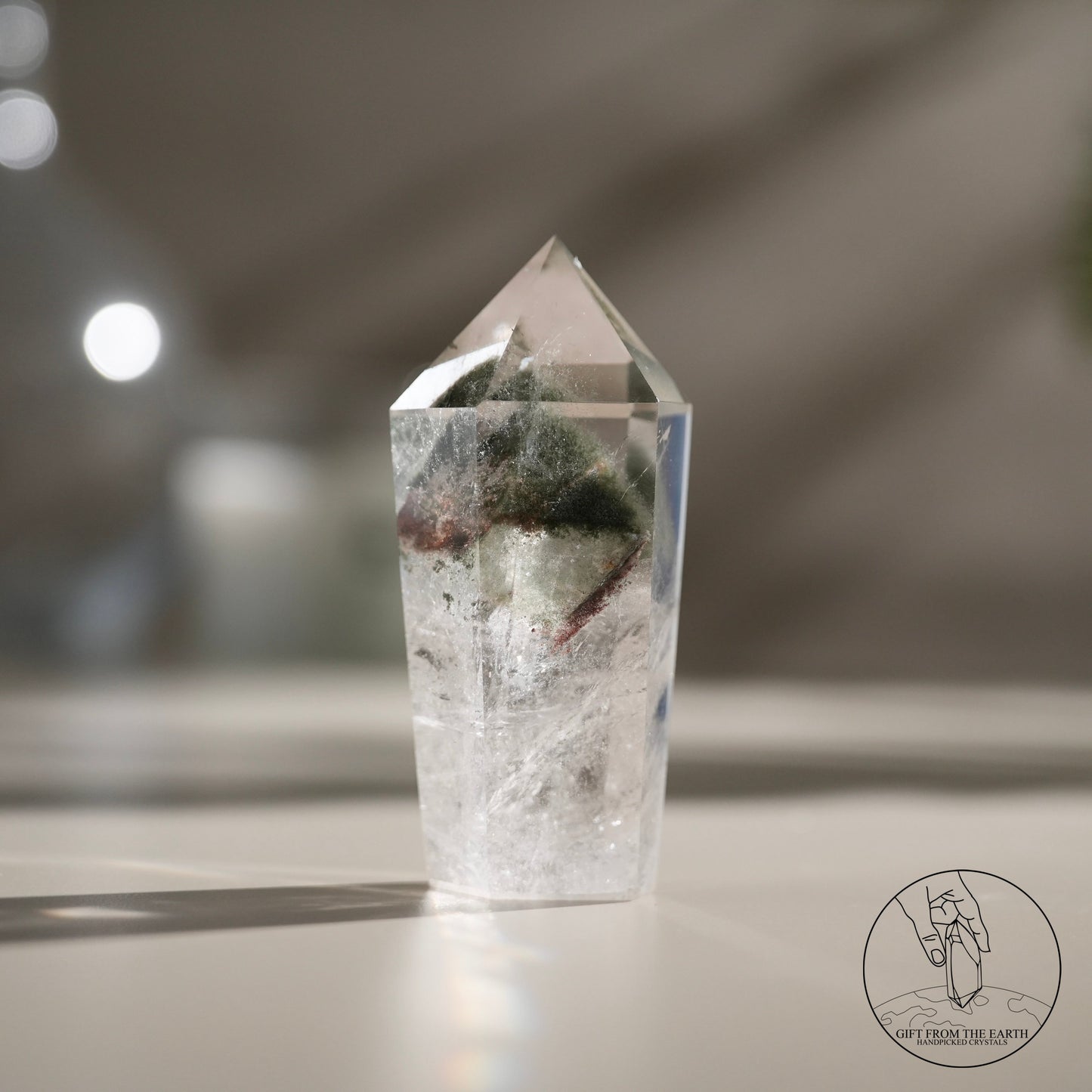 Pyramid red-green phantom quartz point