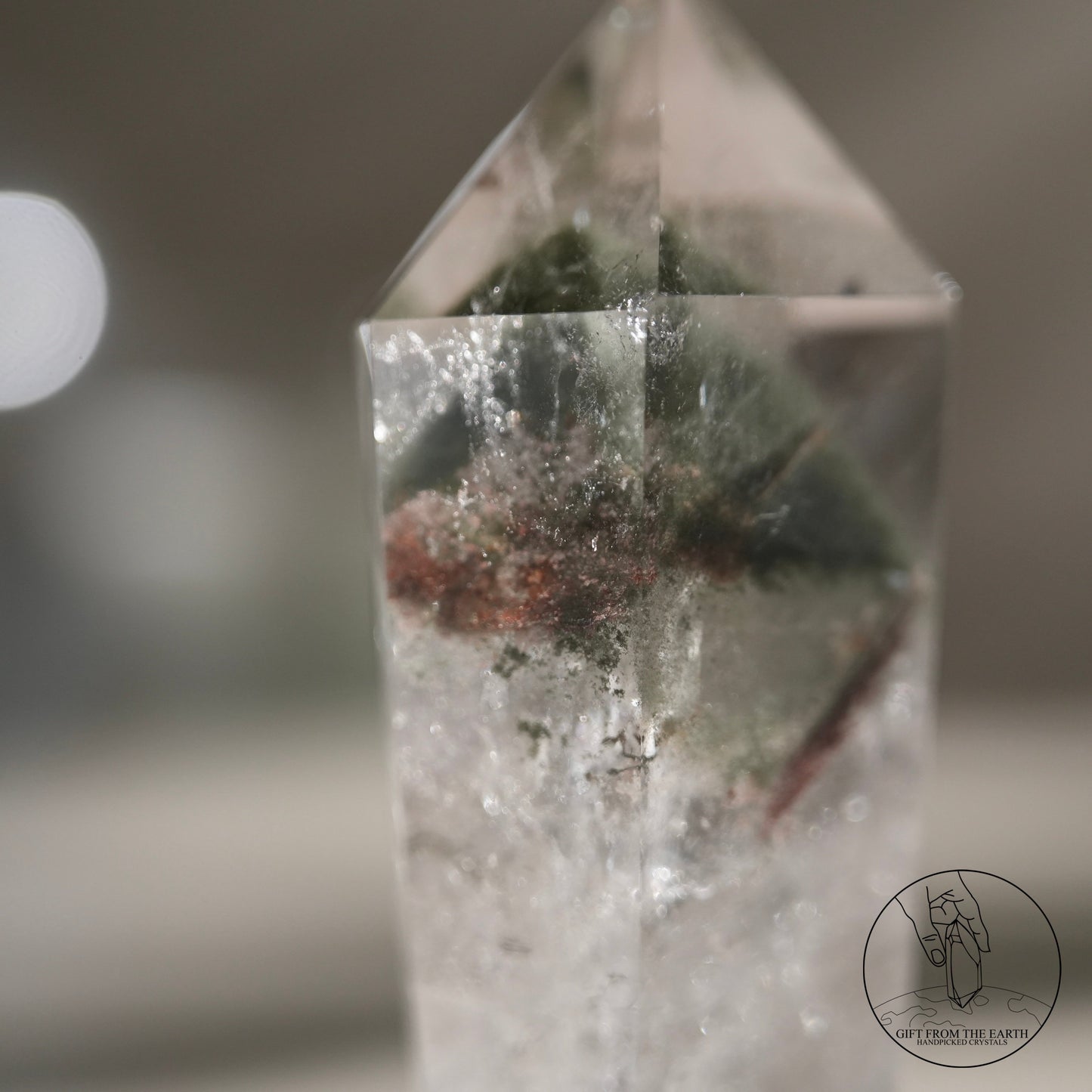 Pyramid red-green phantom quartz point