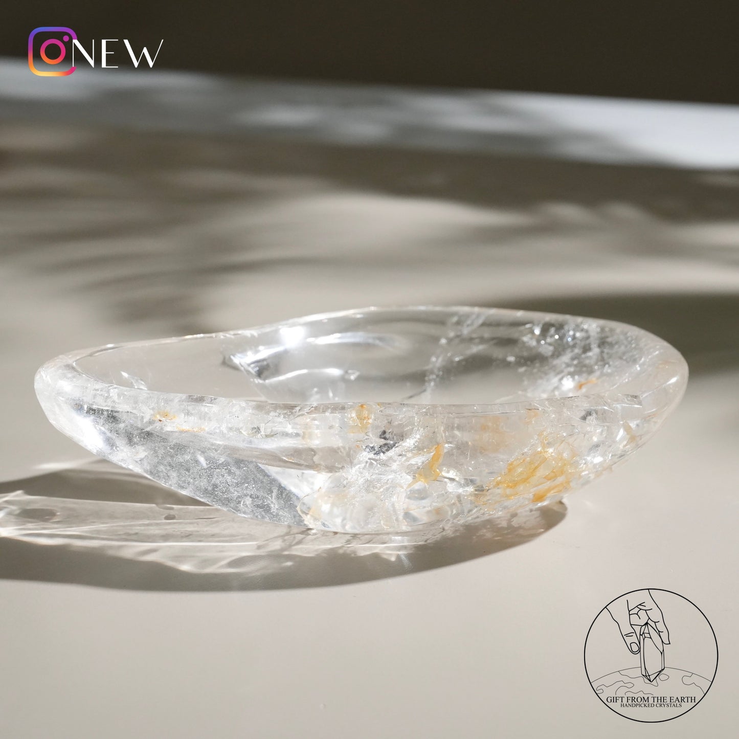 Clear quartz bowl with golden healer