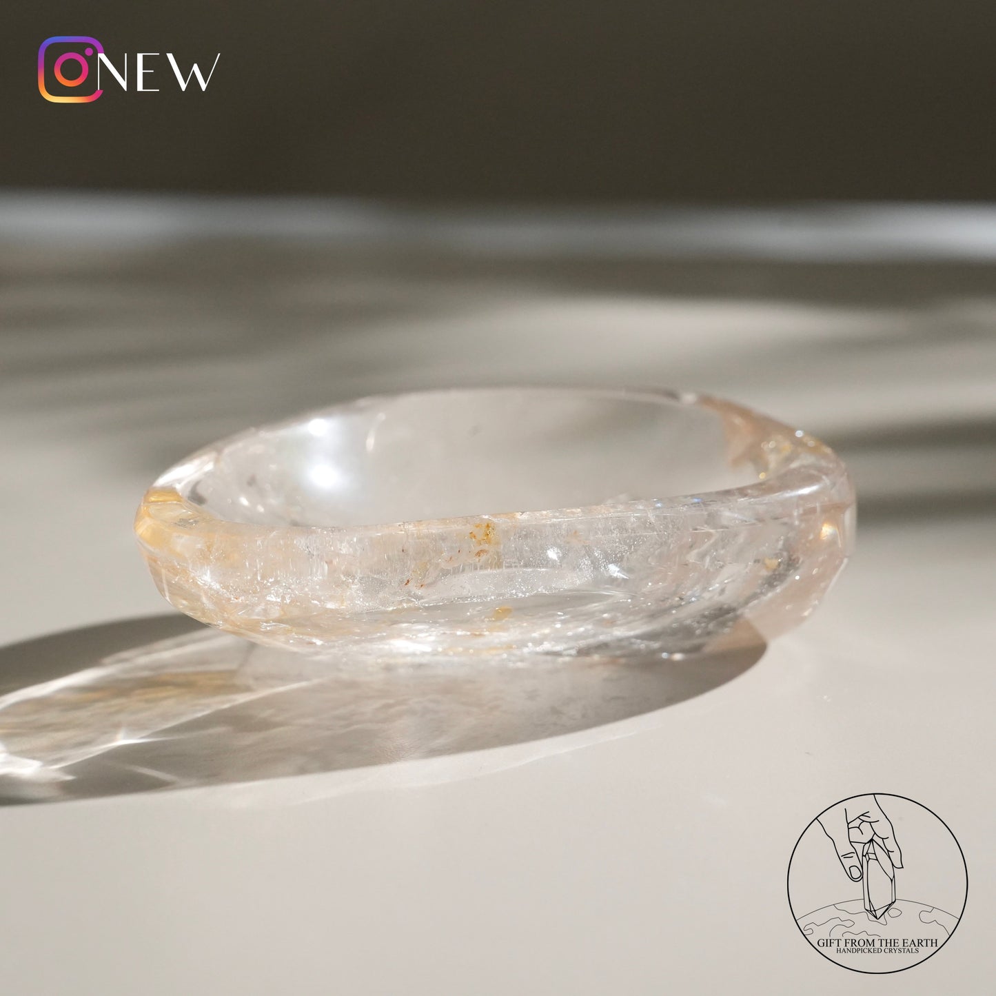 Clear quartz bowl with golden healer