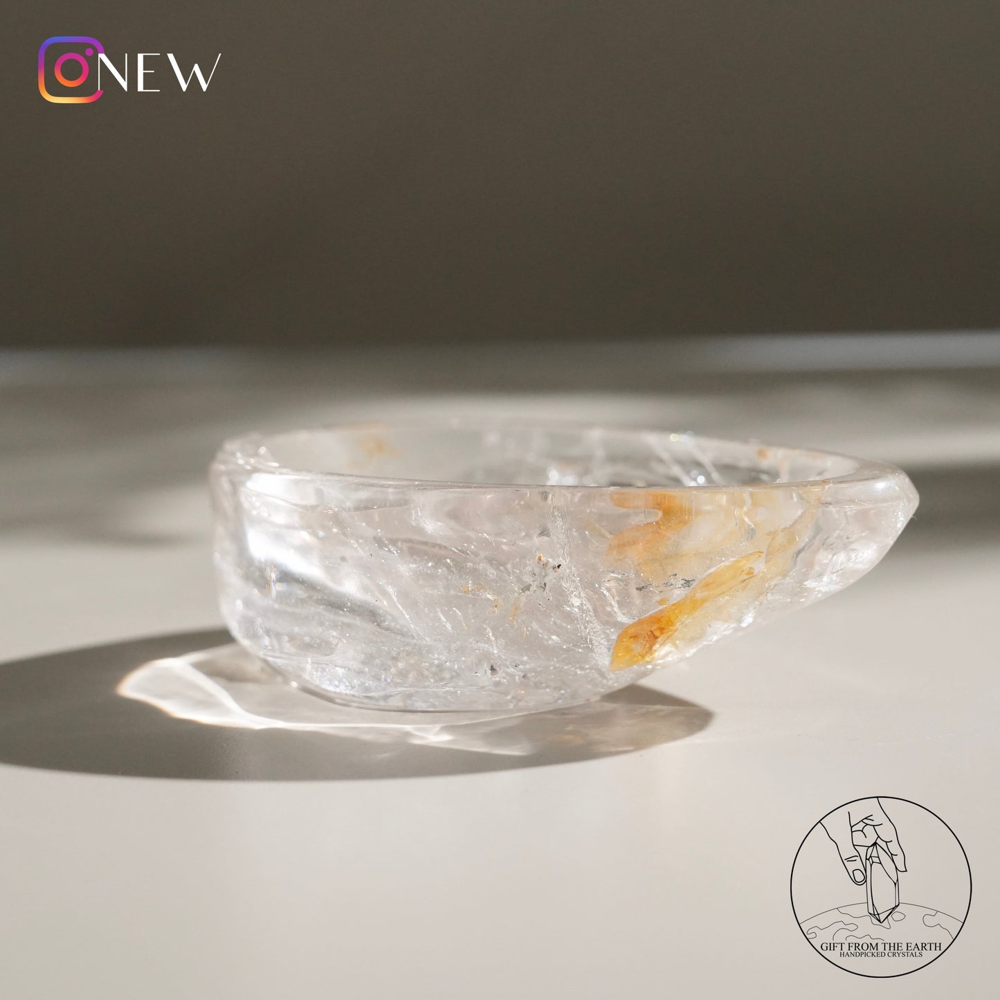 Clear quartz bowl with golden healer