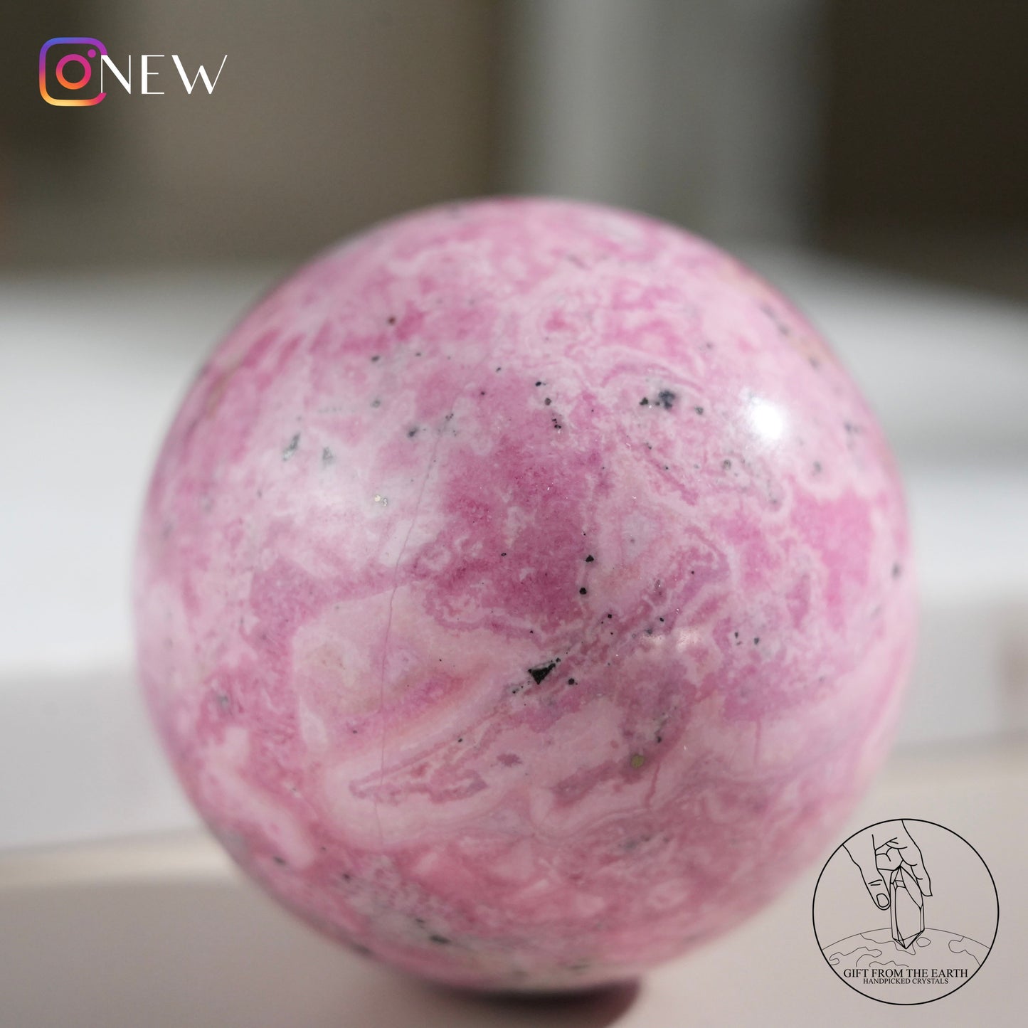 Peruvian rhodochrosite sphere