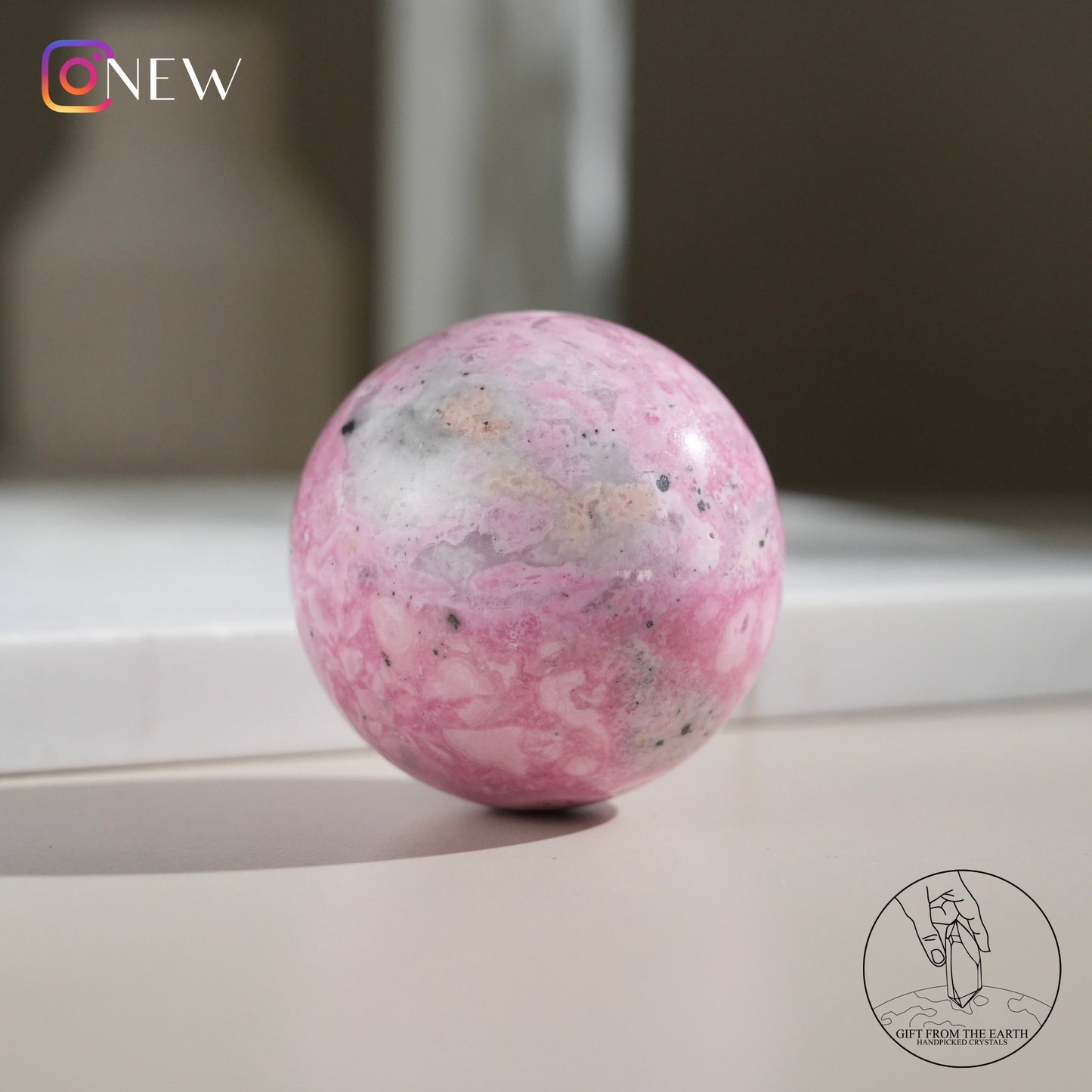 Peruvian rhodochrosite sphere