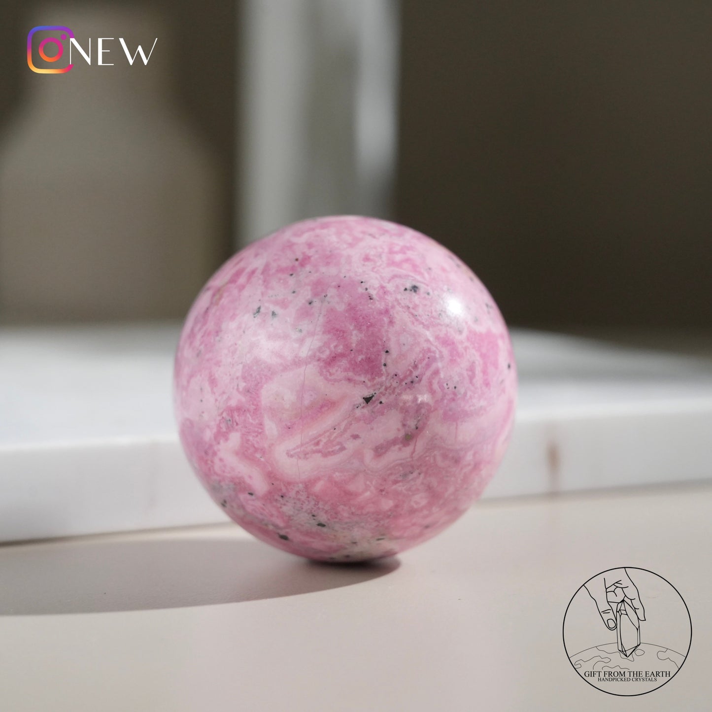 Peruvian rhodochrosite sphere