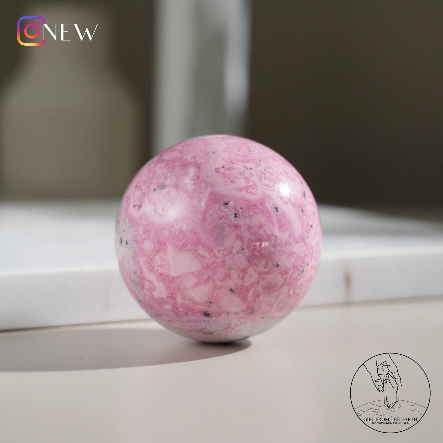 Peruvian rhodochrosite sphere