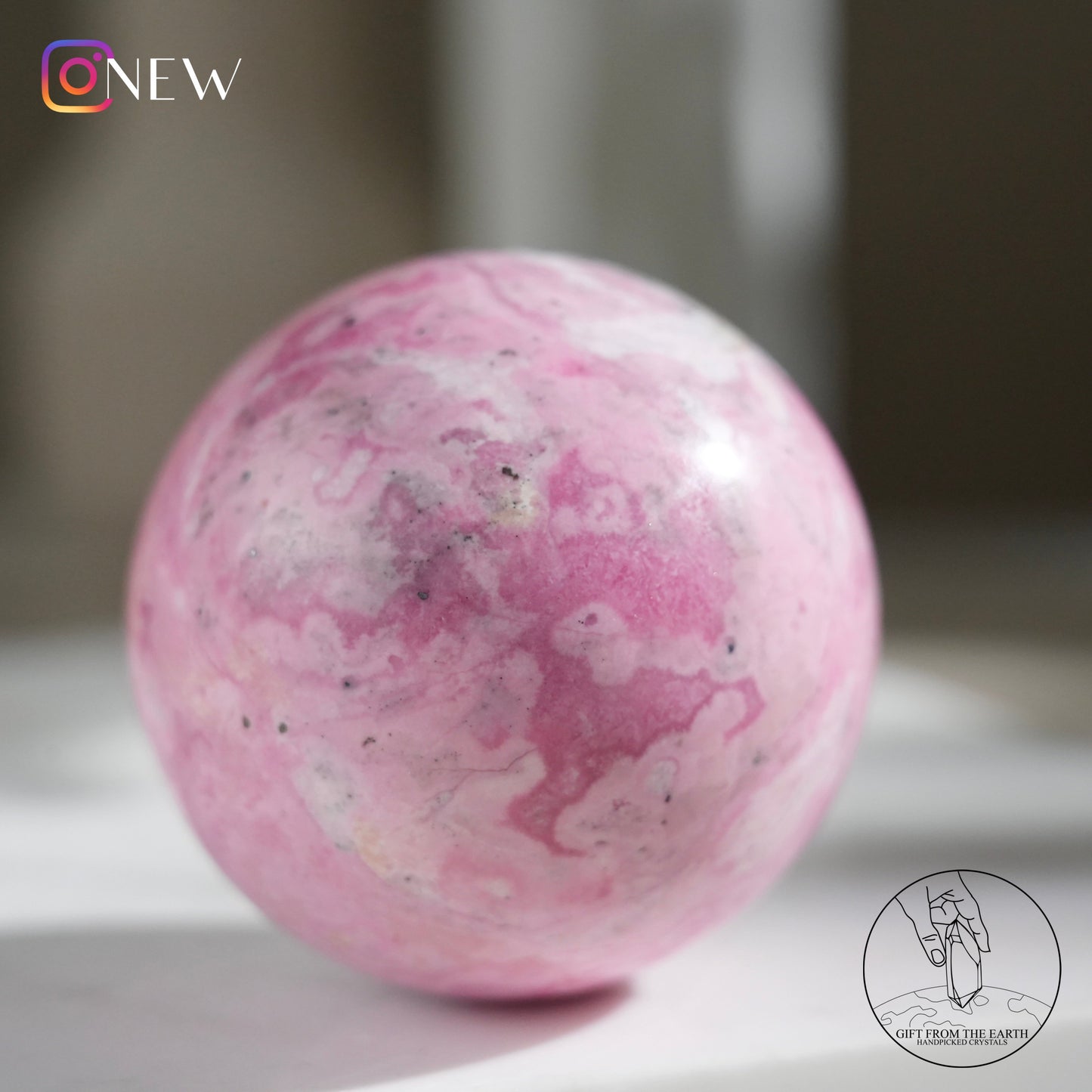 Peruvian rhodochrosite sphere