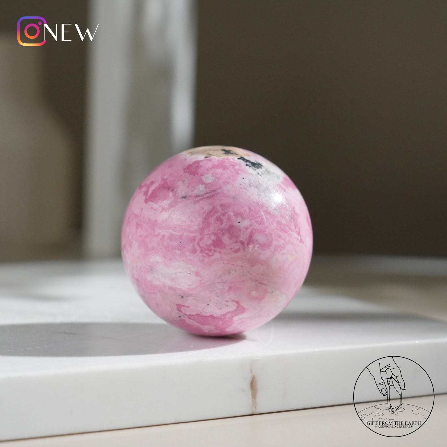 Peruvian rhodochrosite sphere