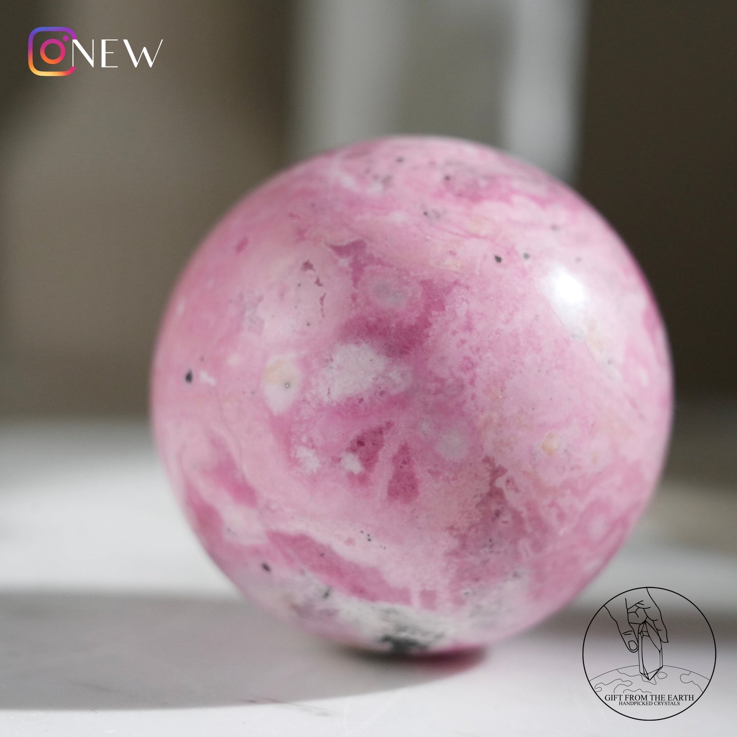 Peruvian rhodochrosite sphere