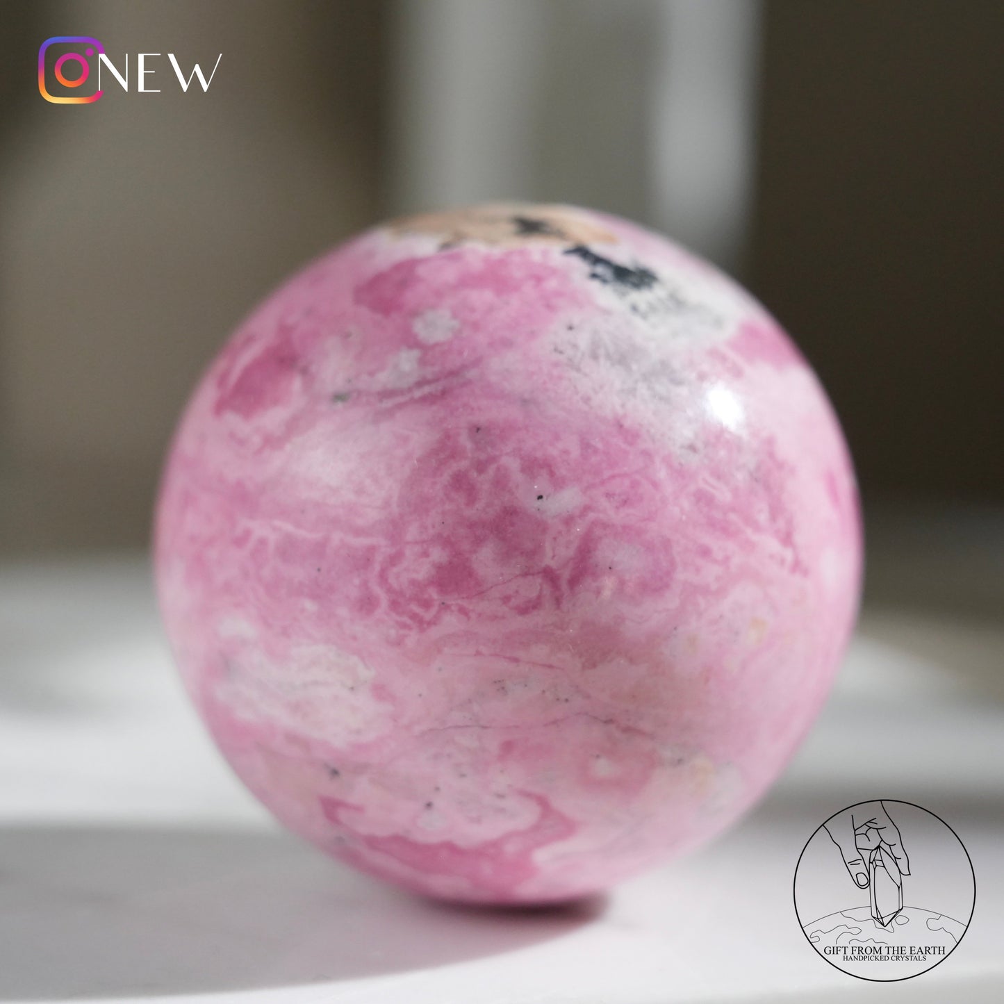 Peruvian rhodochrosite sphere