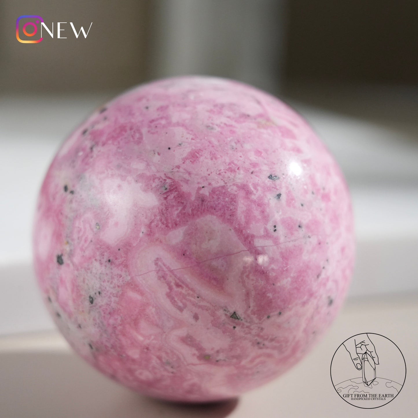 Peruvian rhodochrosite sphere