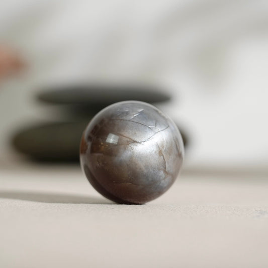 Black sunstone sphere