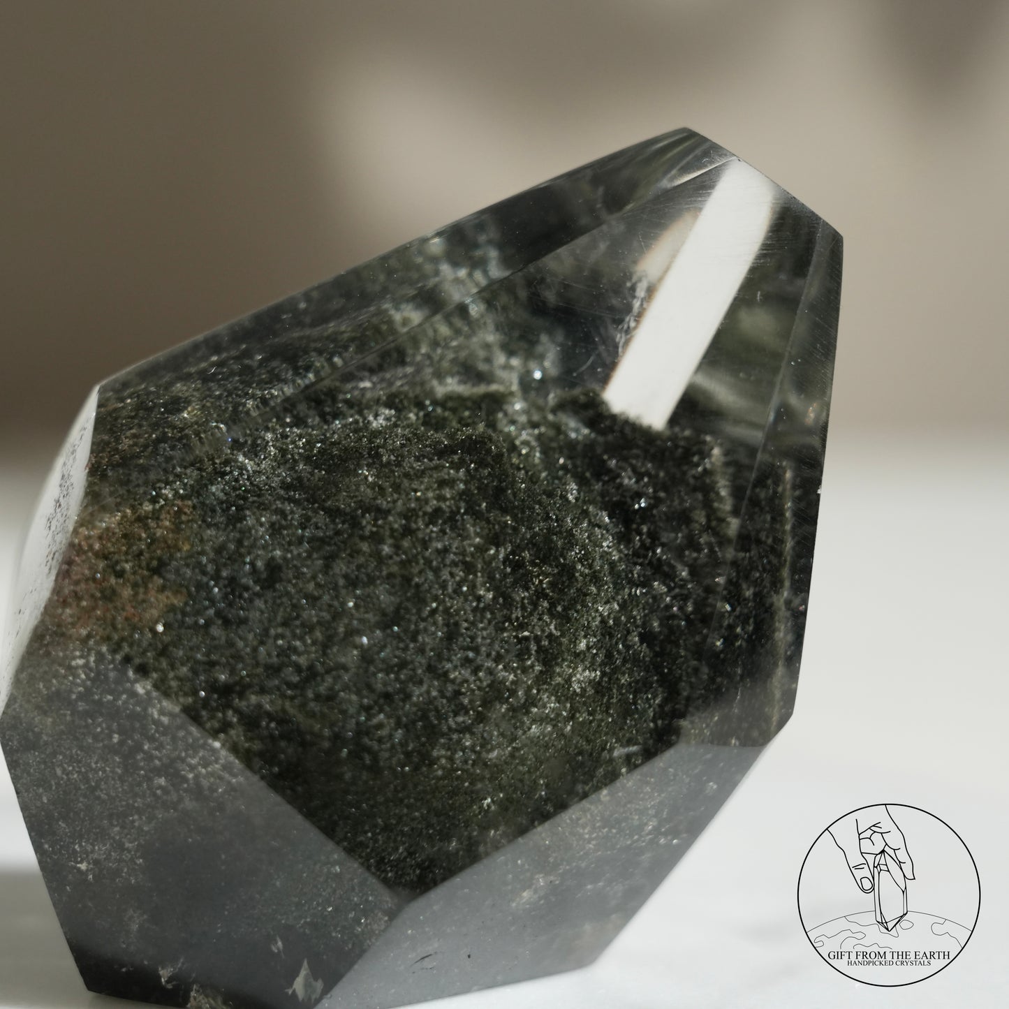 Half-polished multi-layered red-green phantom quartz point